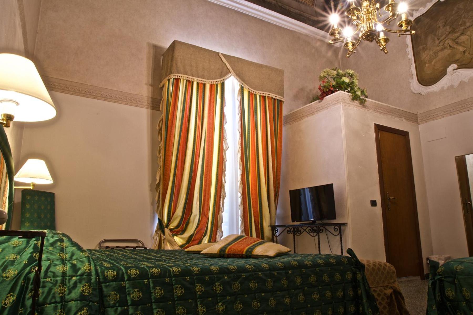 Quadruple Room - Photo 7