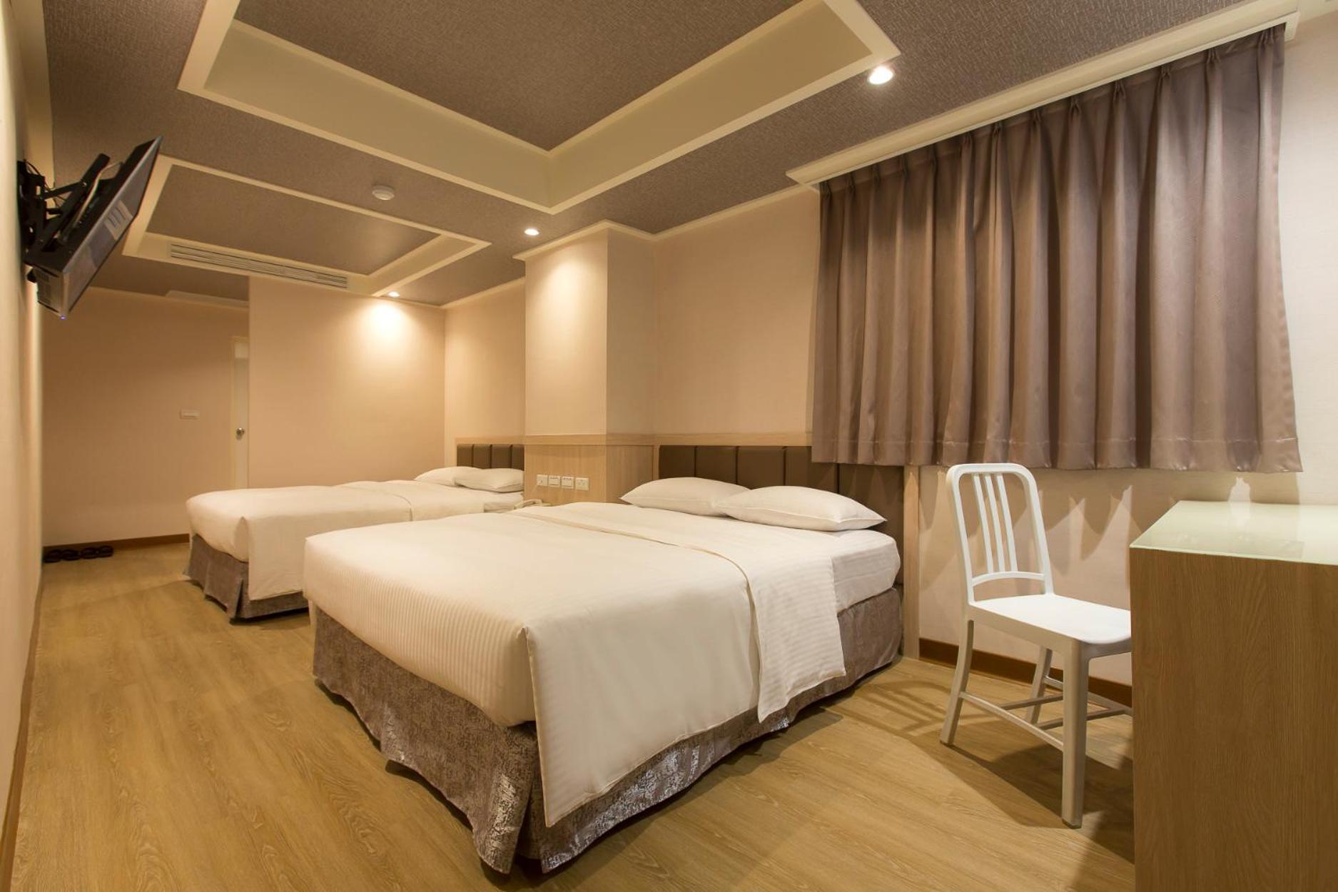 Business Quadruple Room - Photo 7