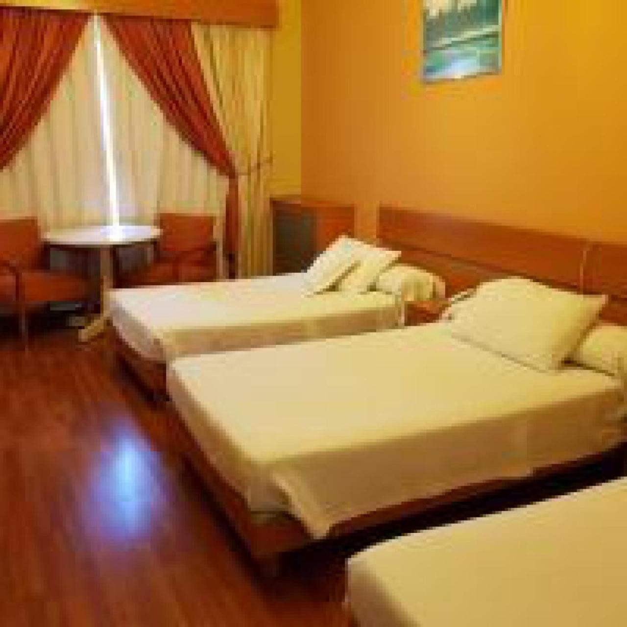 Basic Triple Room photo 2