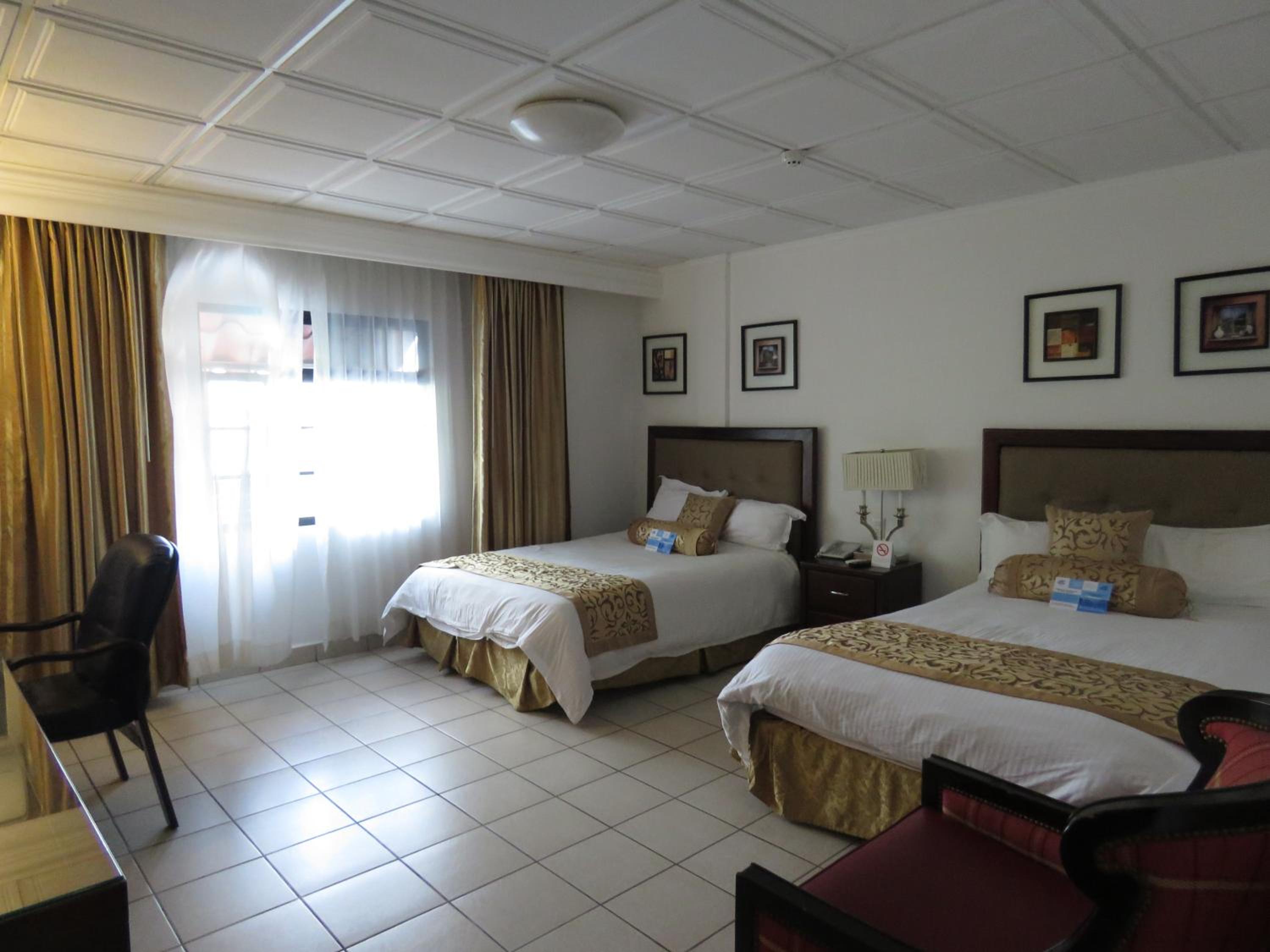Double Room with Two Double Beds photo 2