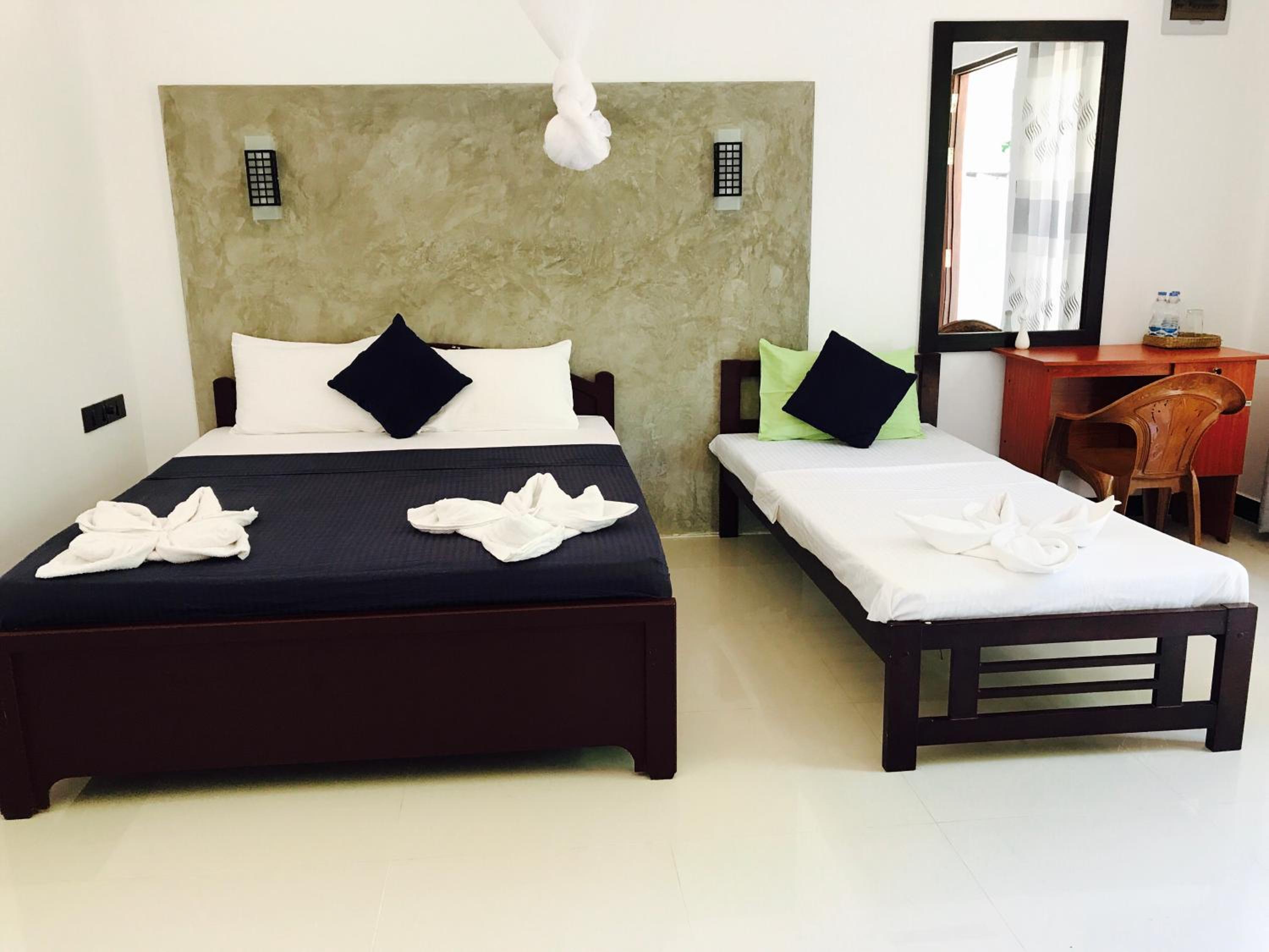 Deluxe Triple Room with Fan  photo 2
