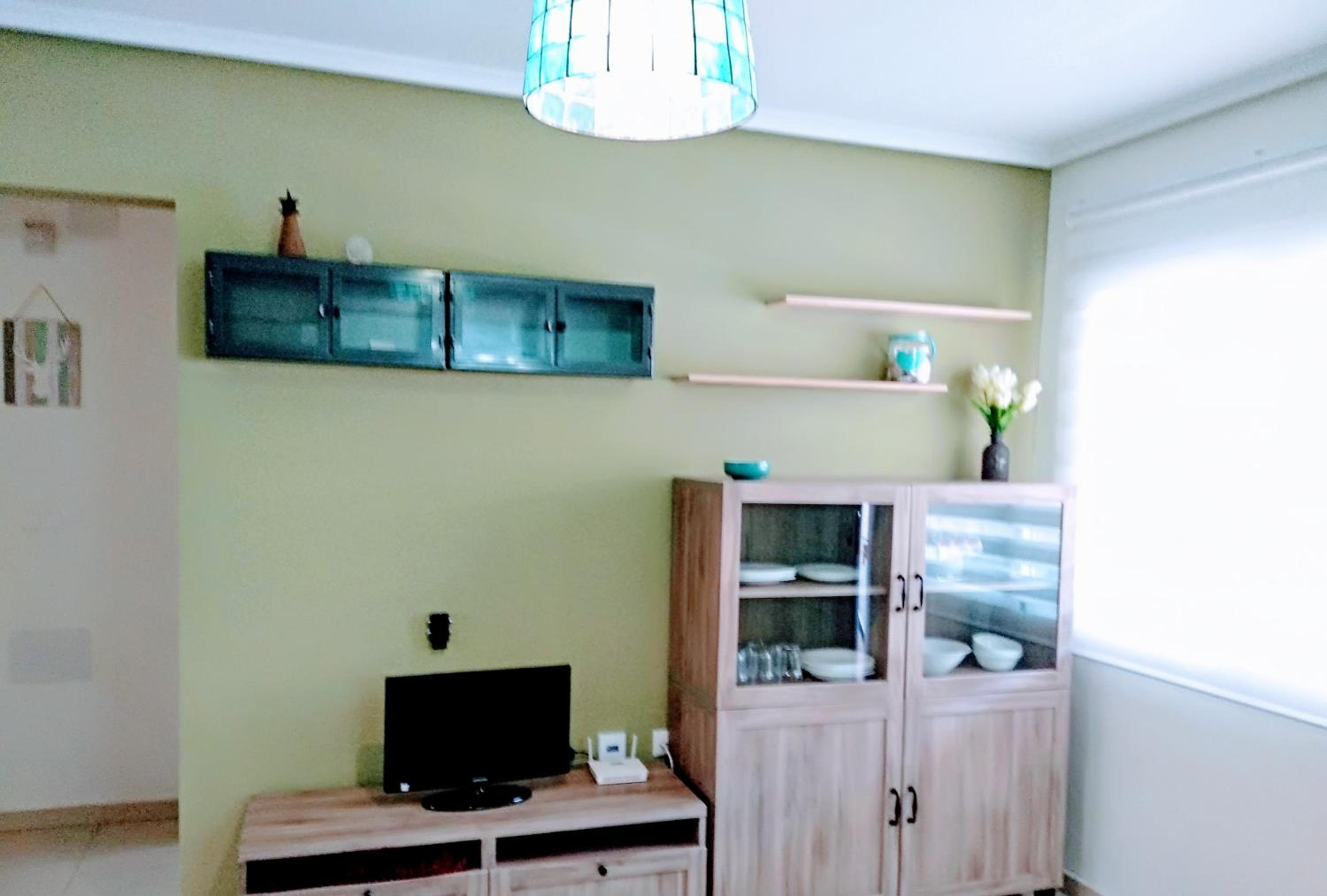 Three-Bedroom House - Photo 22