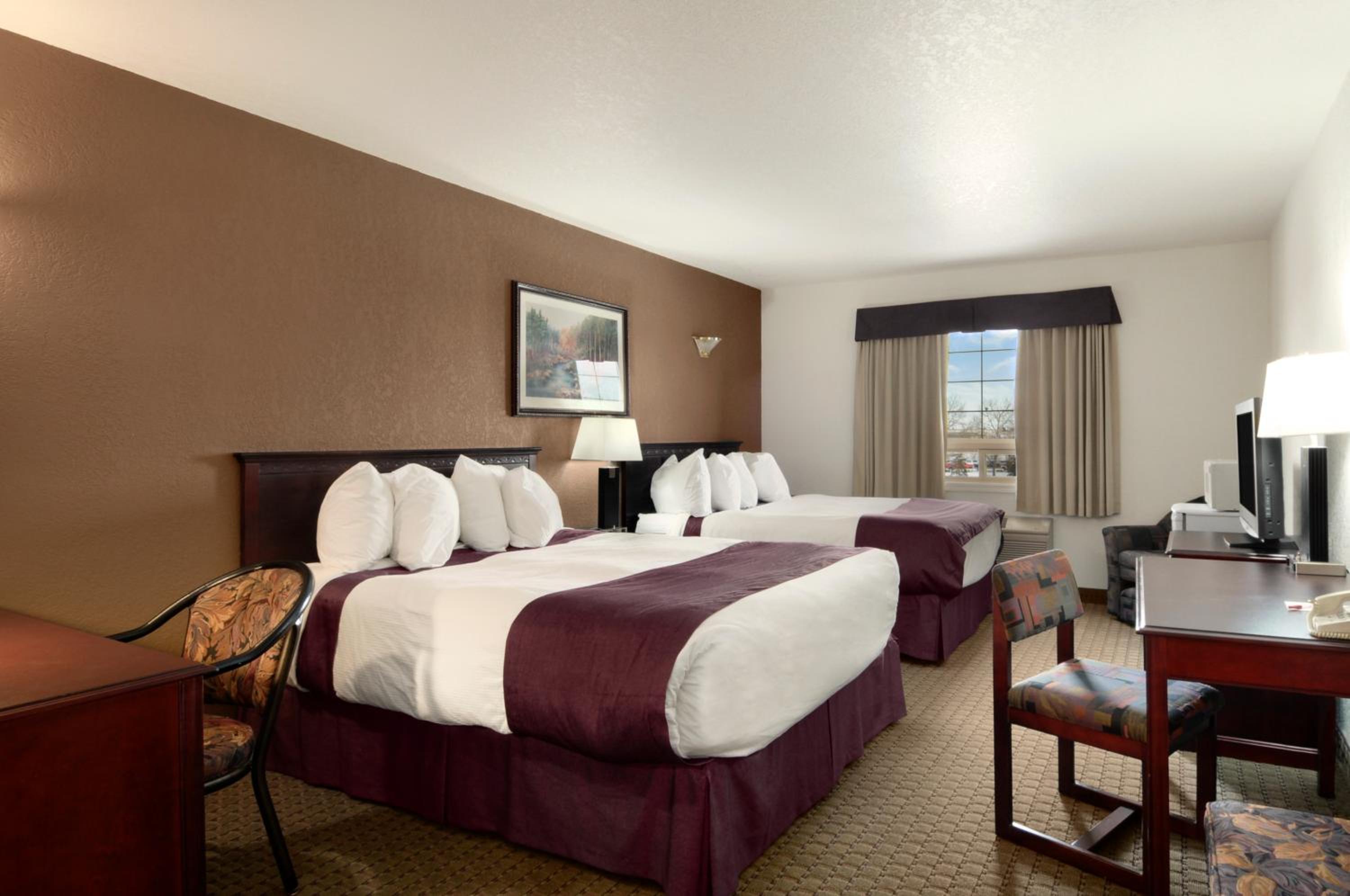 Queen Room with Two Queen Beds - Non-Smoking - Photo 1