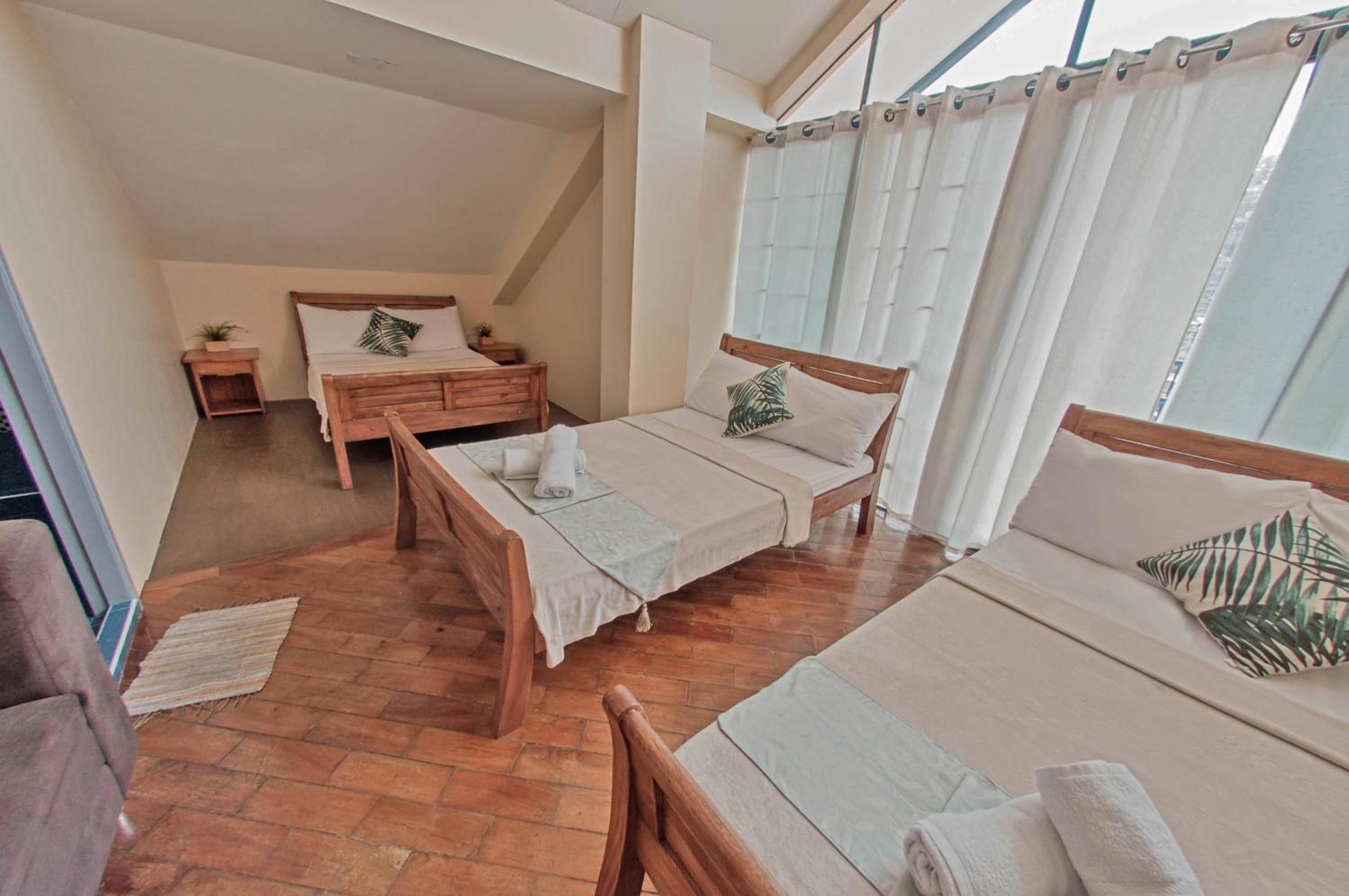 Family Room with Balcony - Photo 1