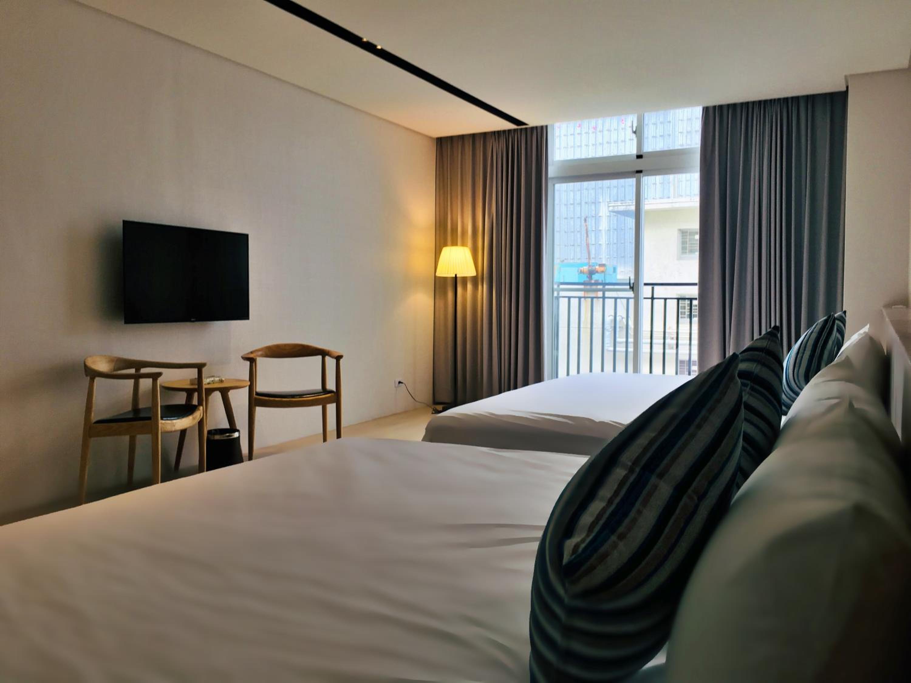 Deluxe Quadruple Room - Photo 11