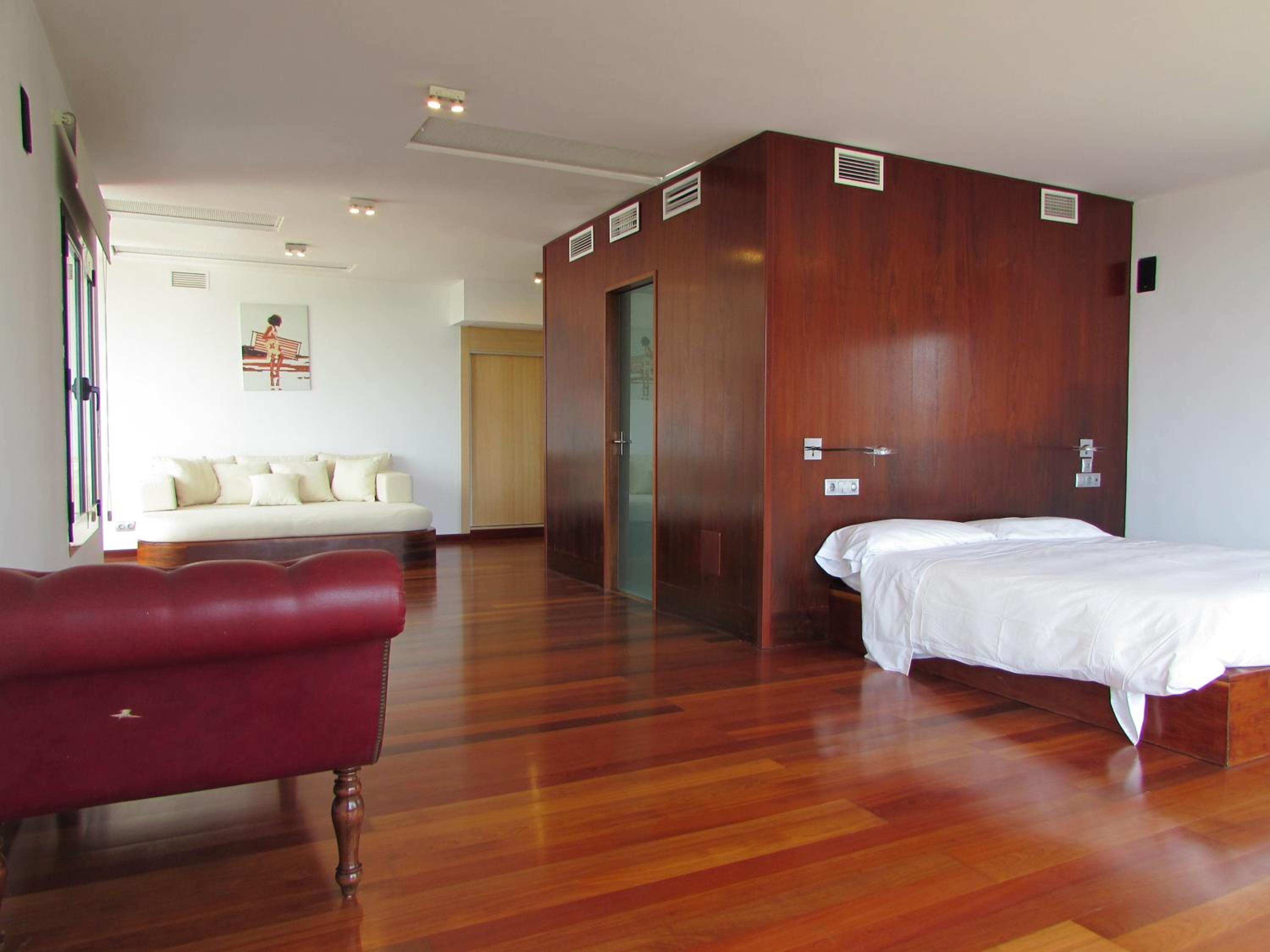 Habitación Deluxe Queen con Dos Camas Queen