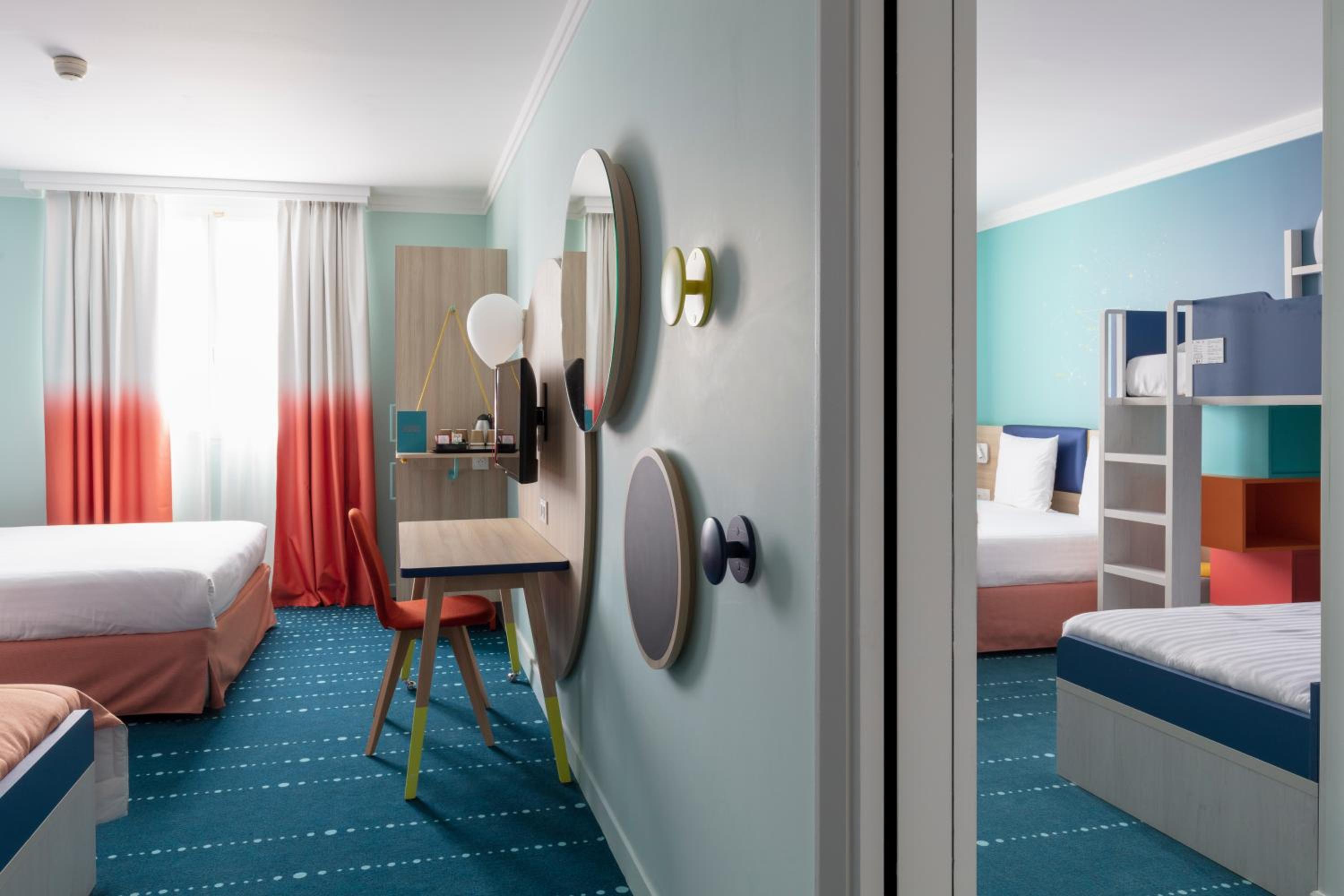 Relax in our vibrant and spacious hotel rooms!