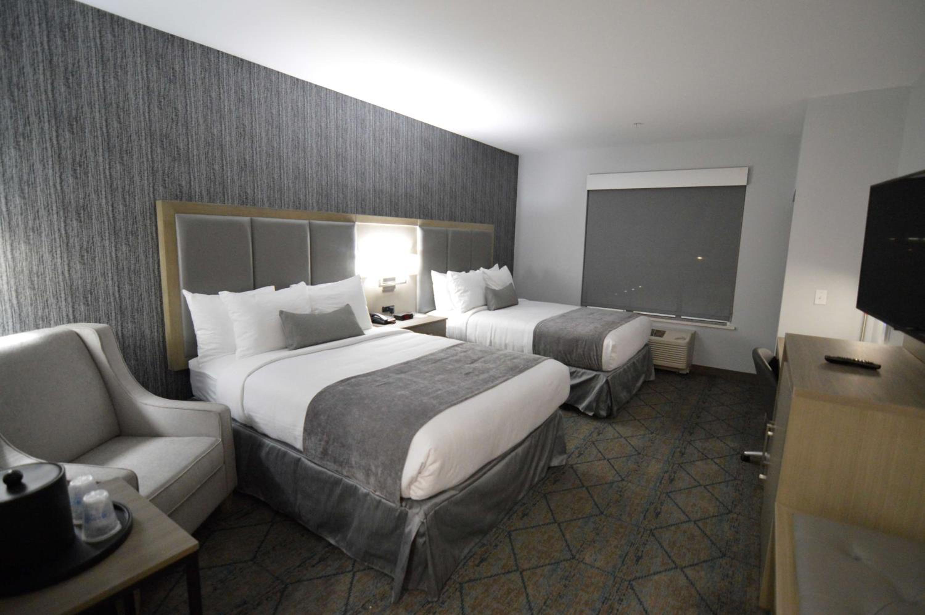 Queen Room with Two Queen Beds and Mobility Accessible Bathtub - Photo 1