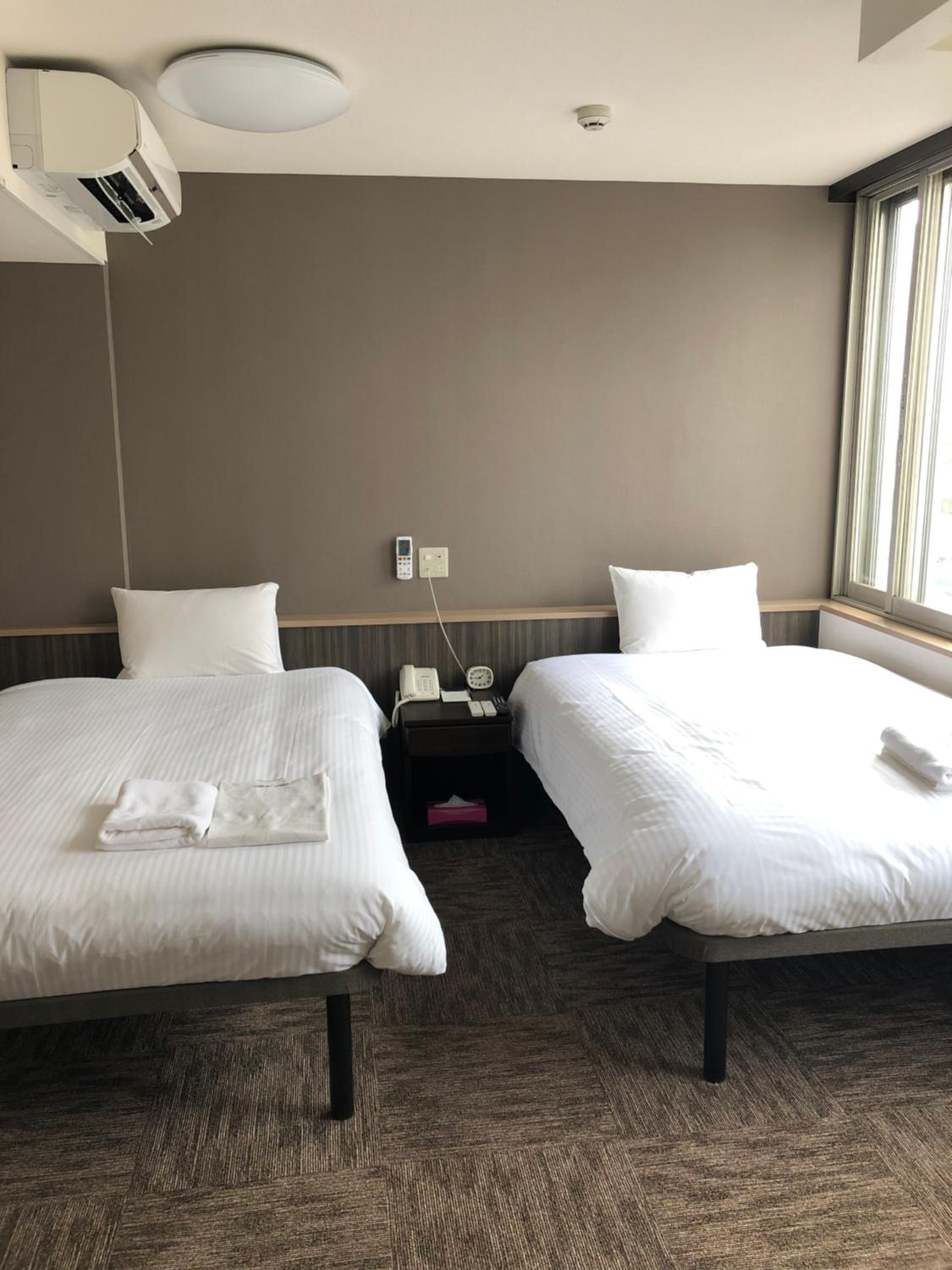 Twin Room - Non-Smoking photo 1