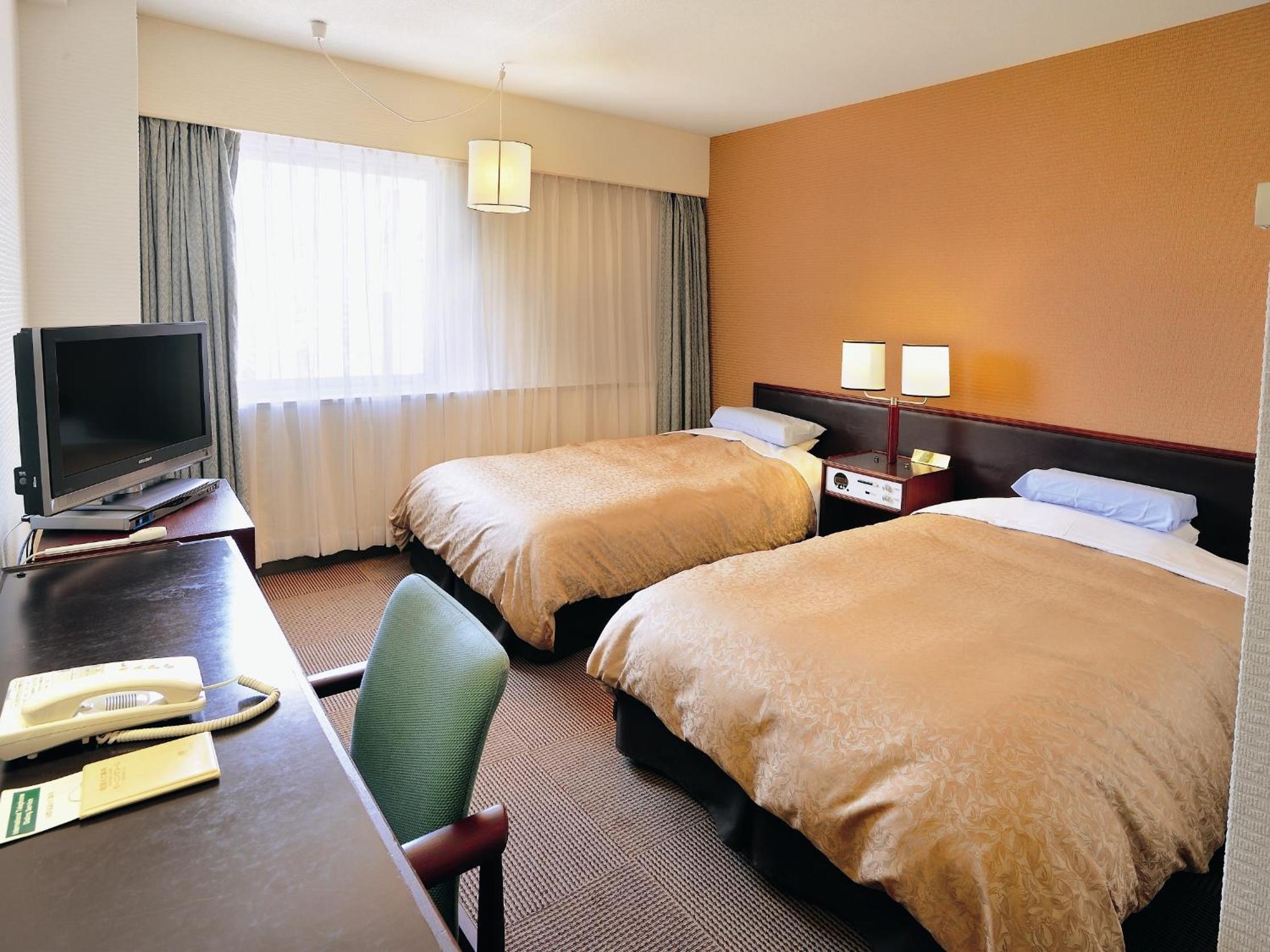 Twin Room - Non-Smoking - Photo 1