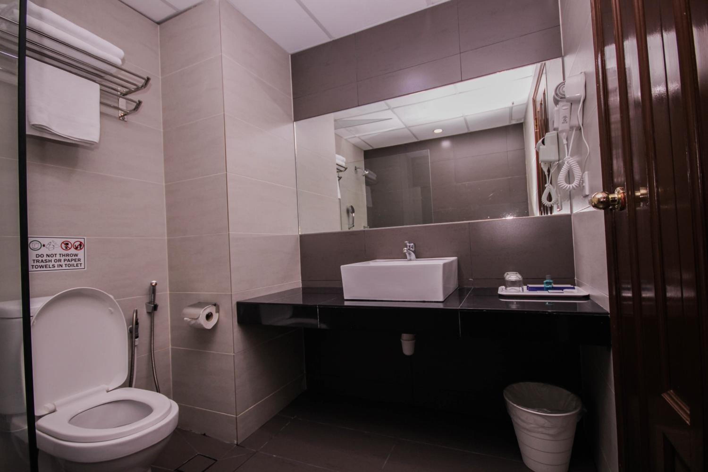 Three-Bedroom Apartment - Photo 12