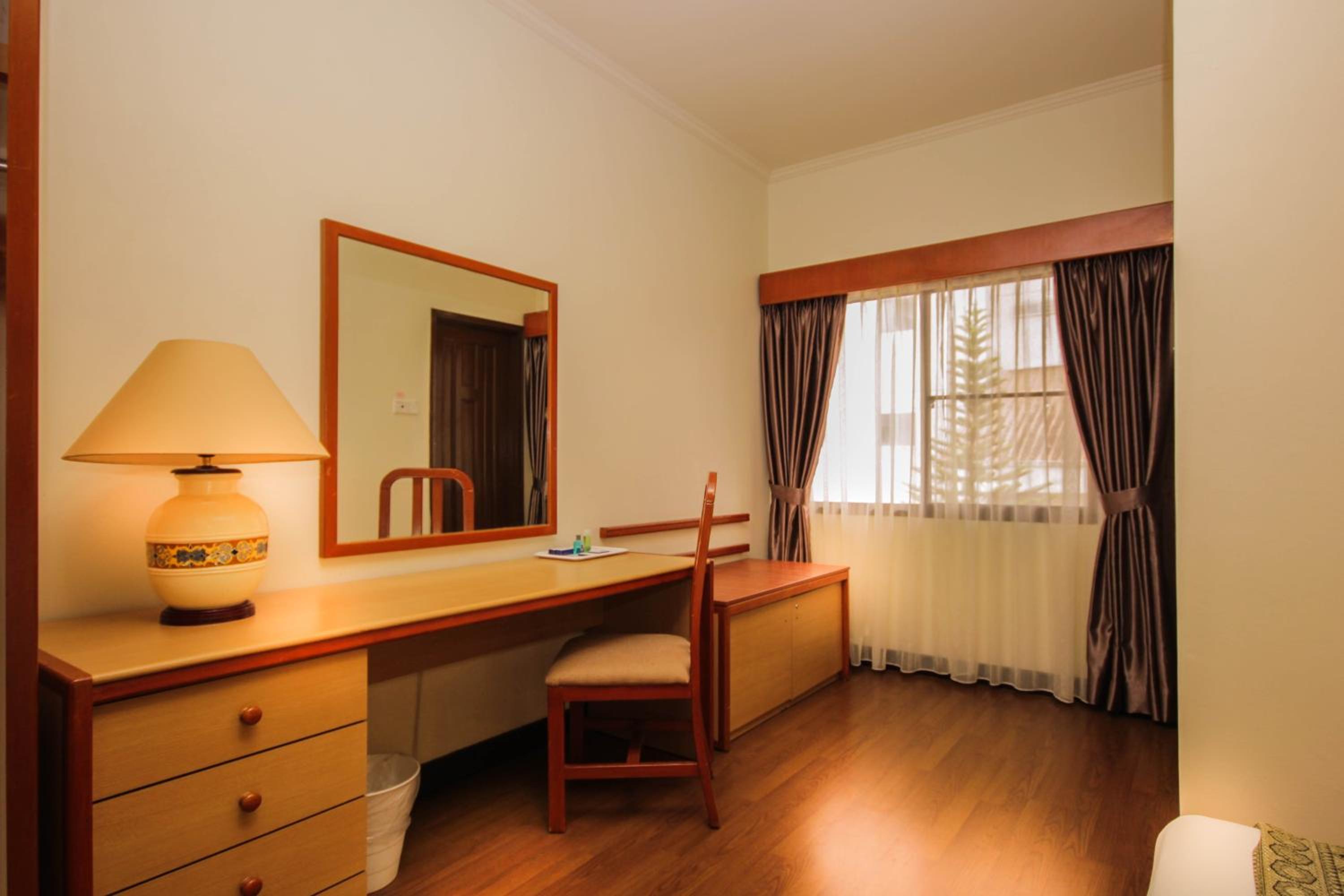 Three-Bedroom Apartment - Photo 10
