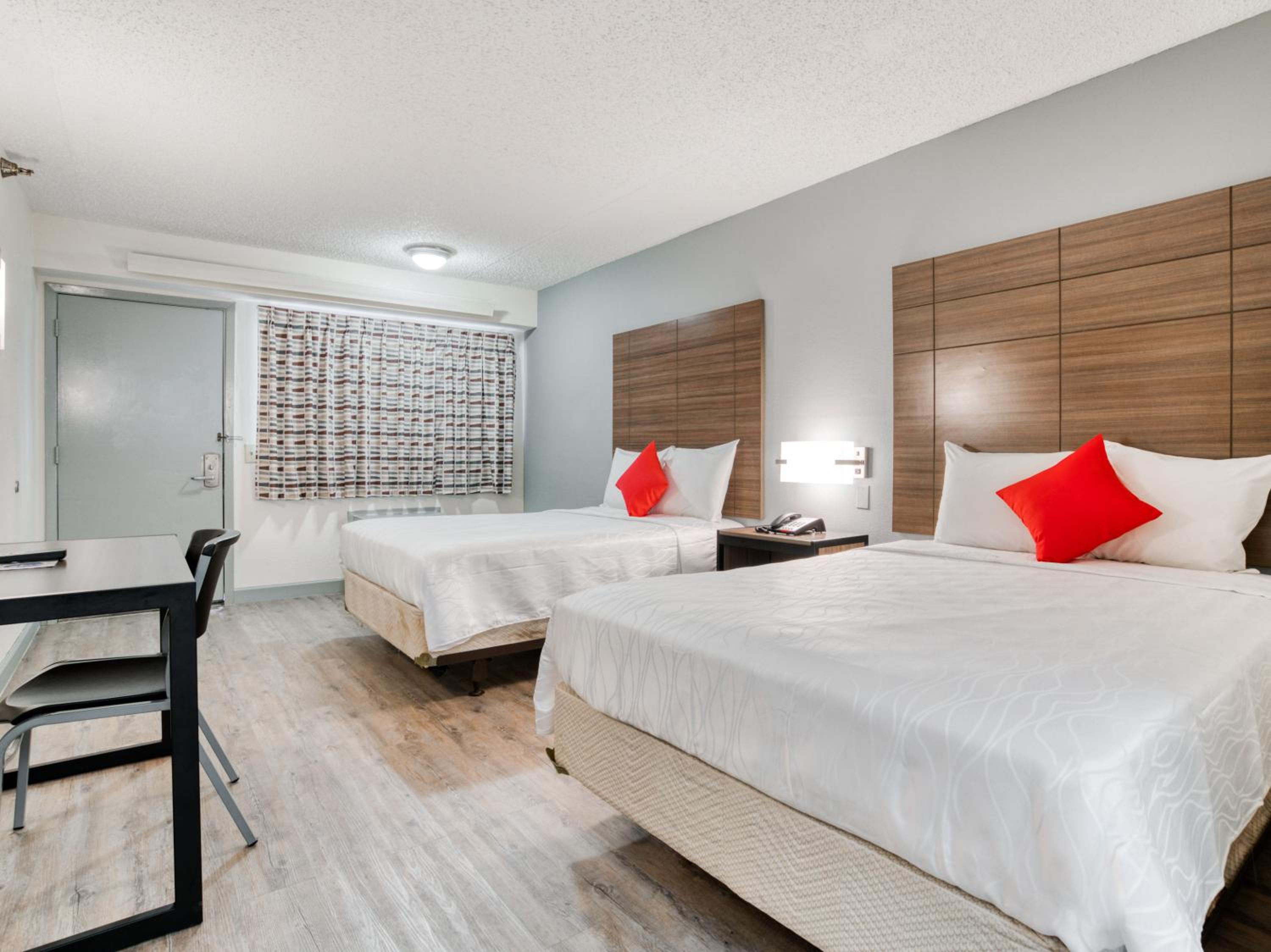 Standard Queen Room with Two Queen Beds photo 1