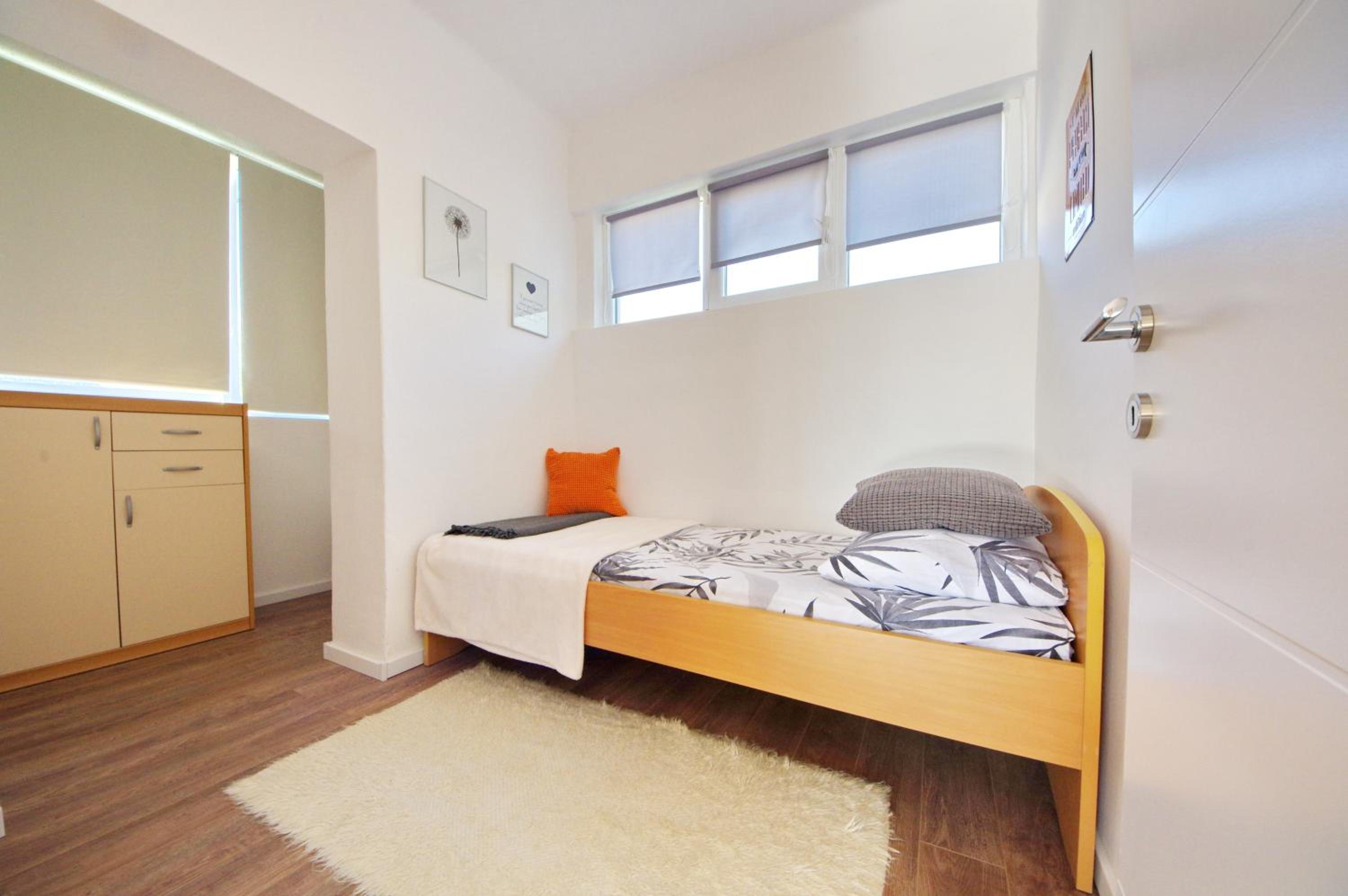 Apartment with Balcony - Photo 18