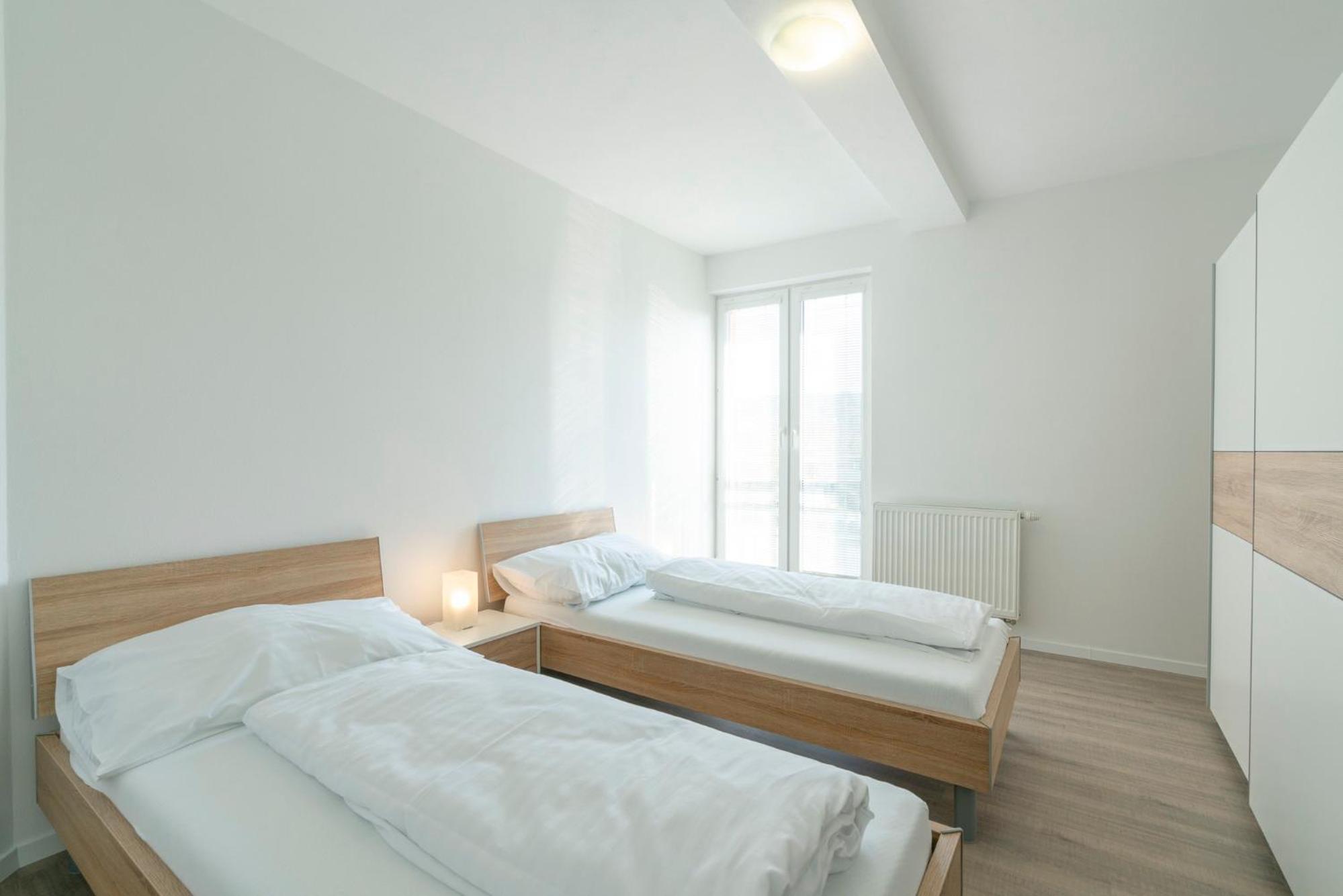 Three-Bedroom Apartment - Photo 2