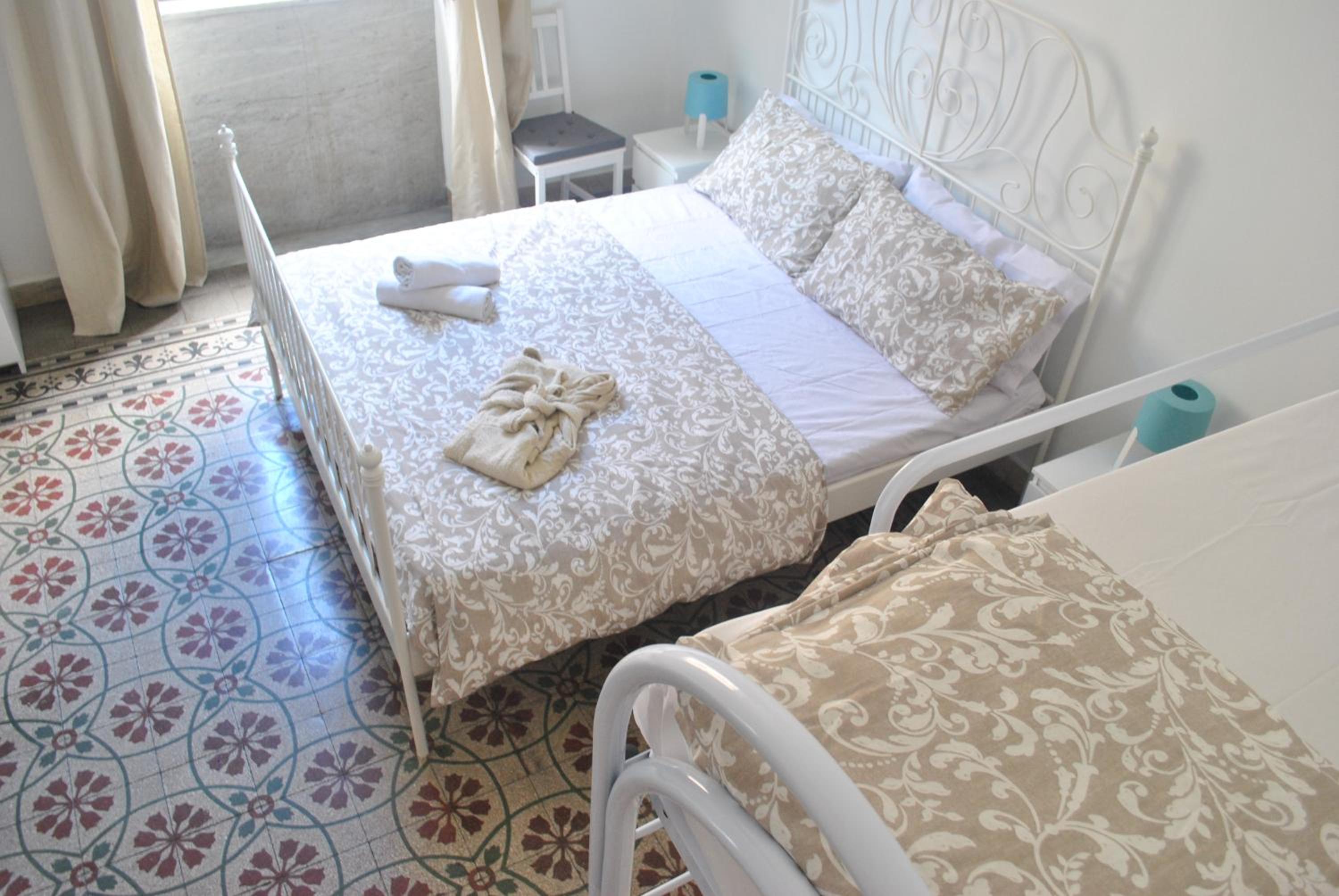 Quadruple Room with Shared Bathroom
