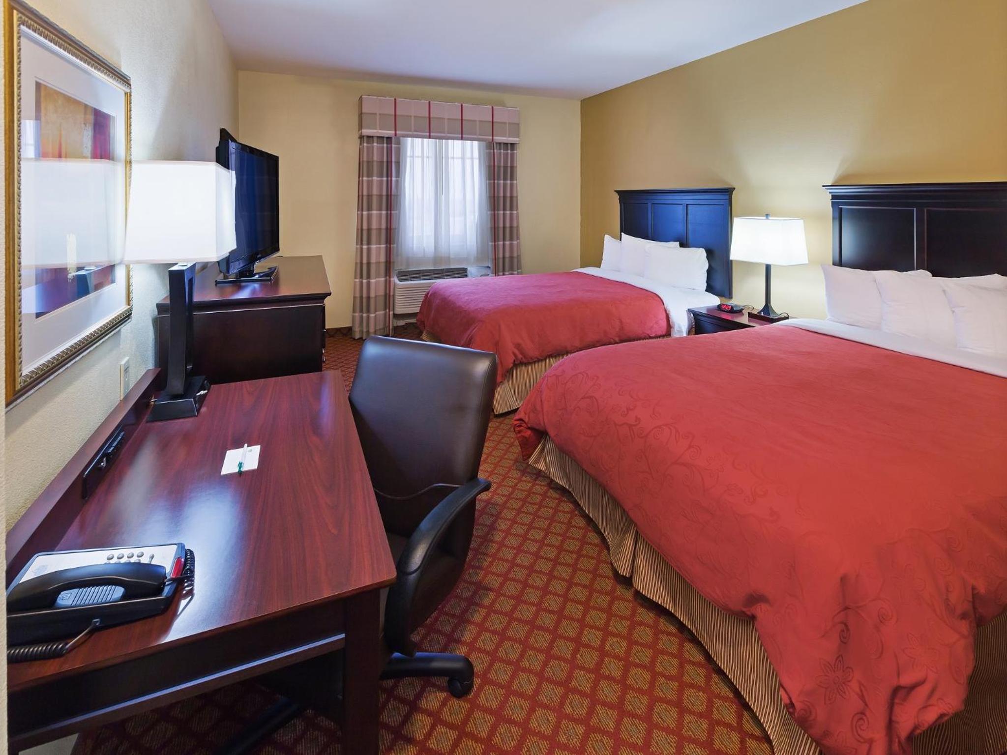 Queen Room with Two Queen Beds - Photo 1