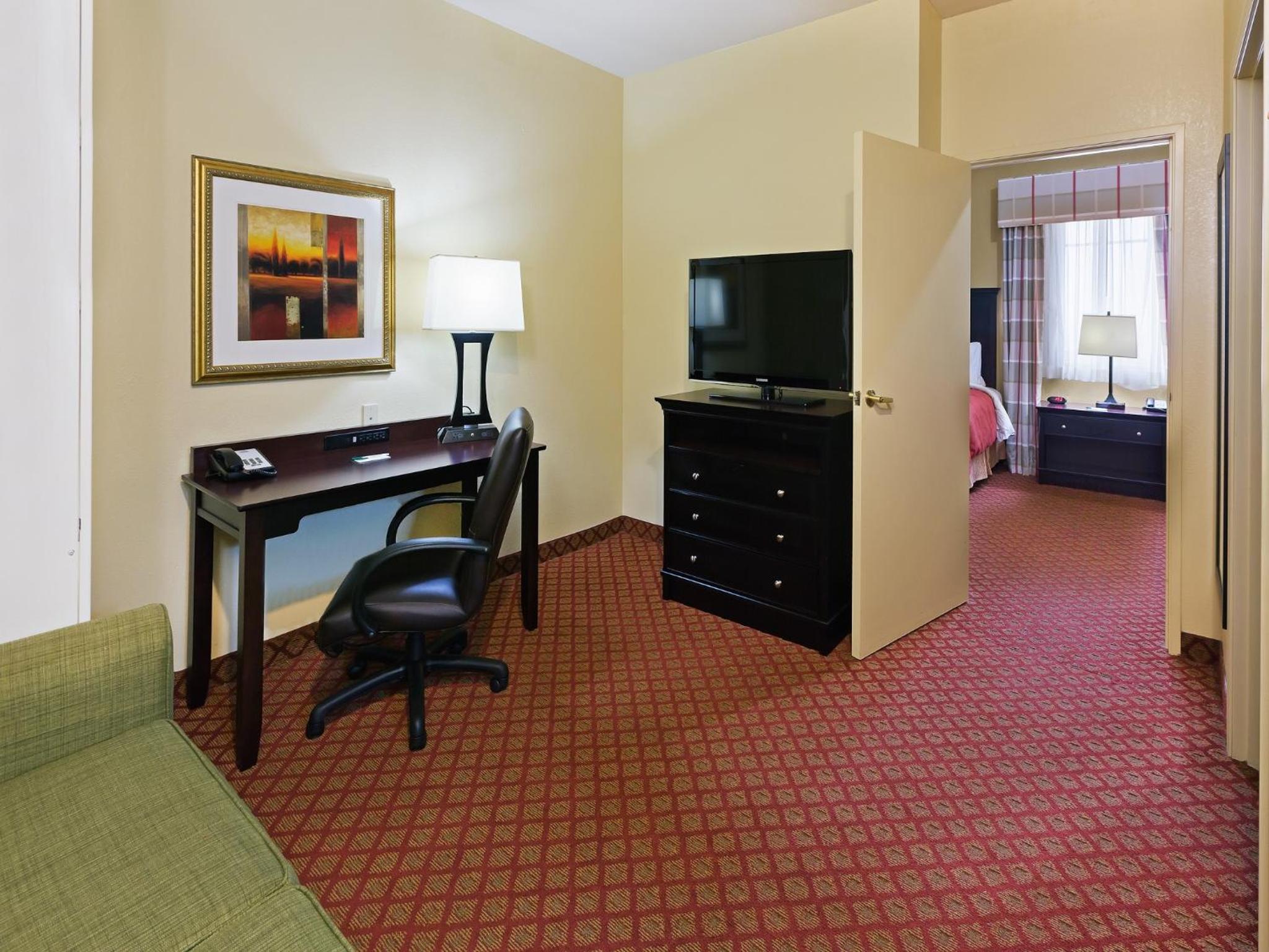 One-Bedroom Queen Suite with Two Queen Beds and Sofa Bed - Non-Smoking - Photo 1