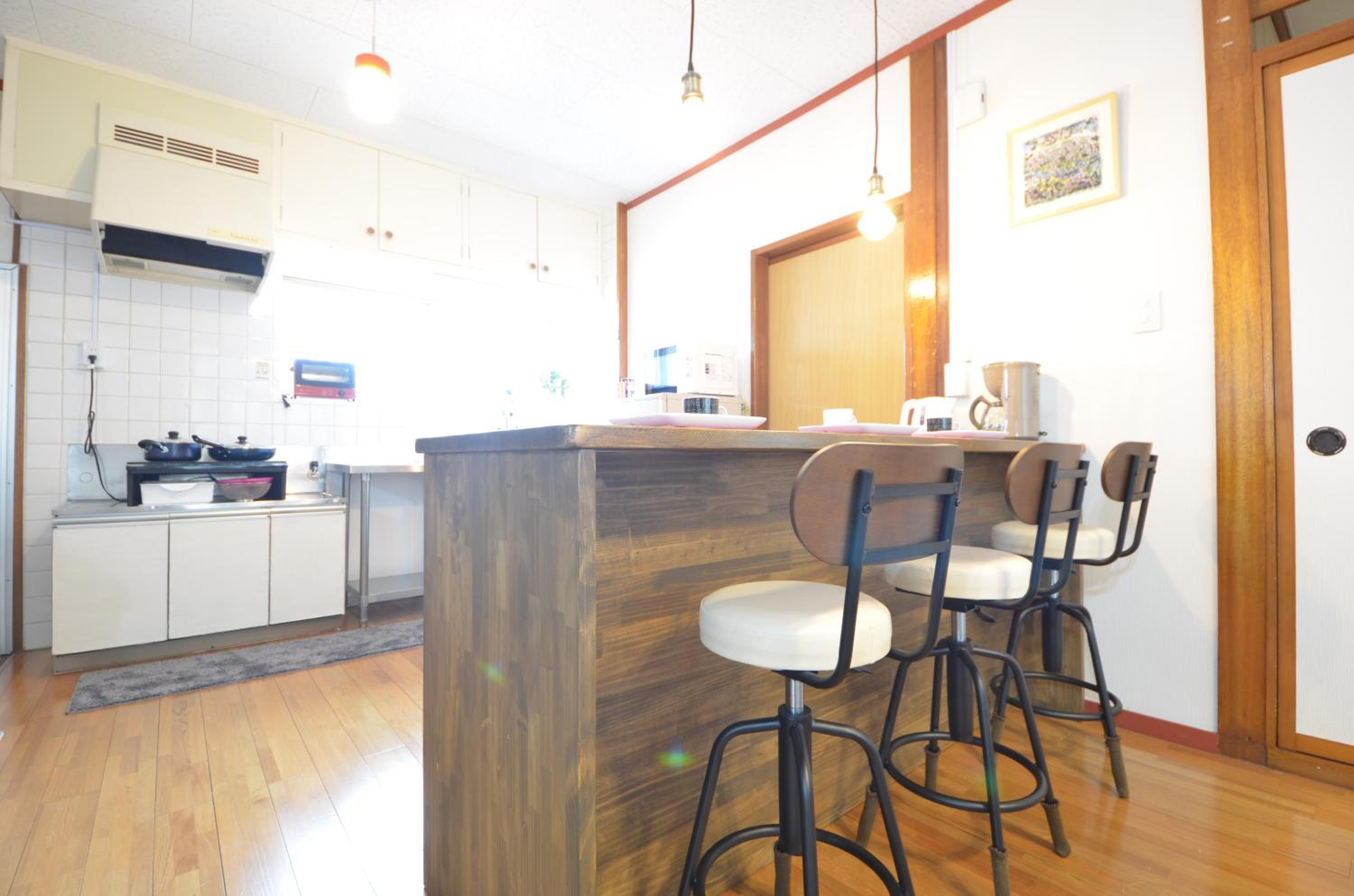 Three-Bedroom Apartment - Photo 10