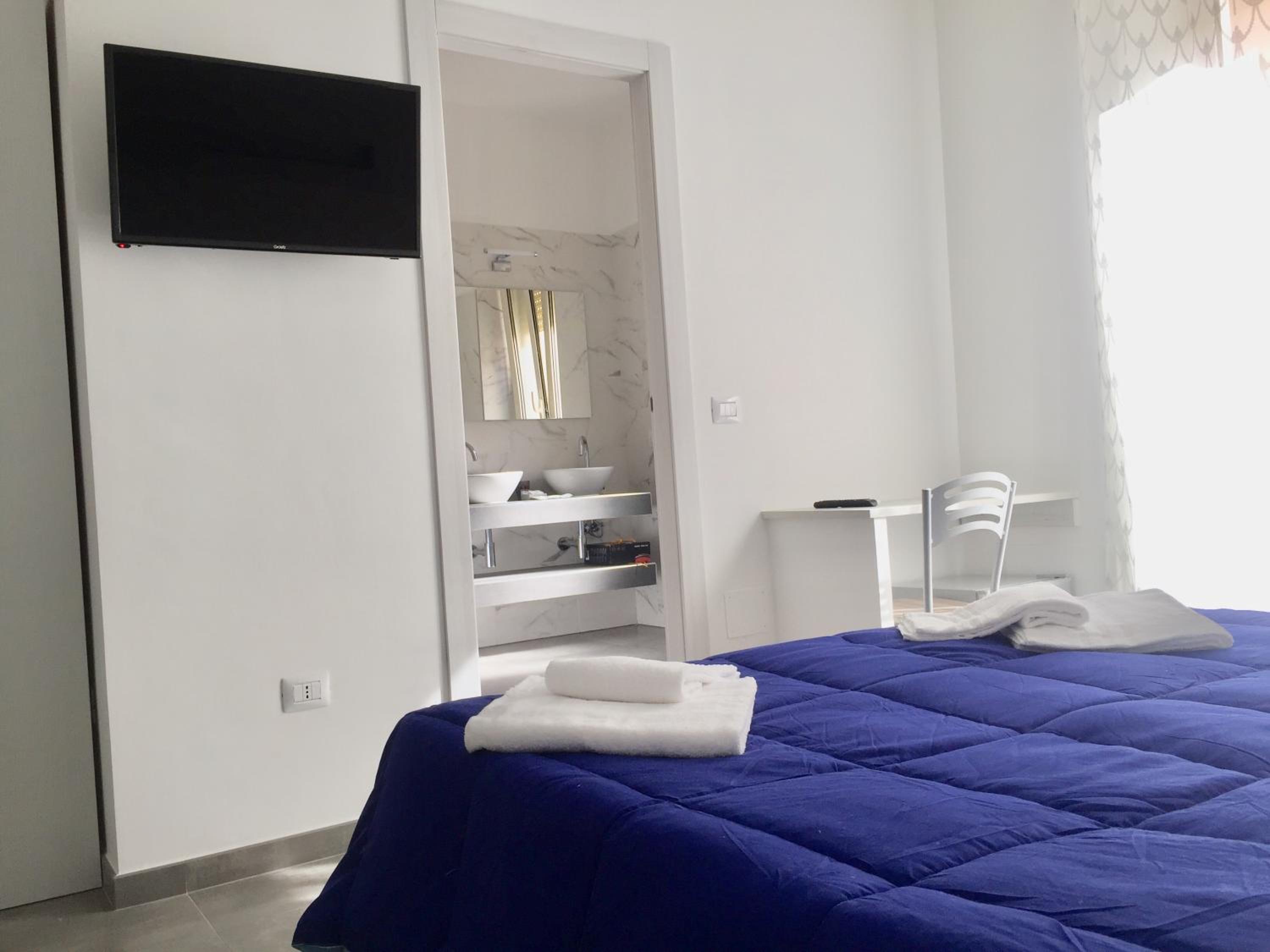 Deluxe Quadruple Room - Photo 1