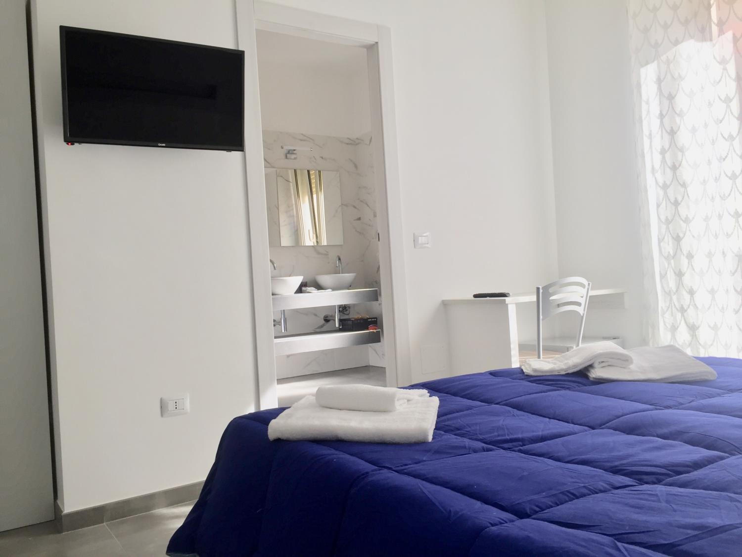 Deluxe Quadruple Room - Photo 4