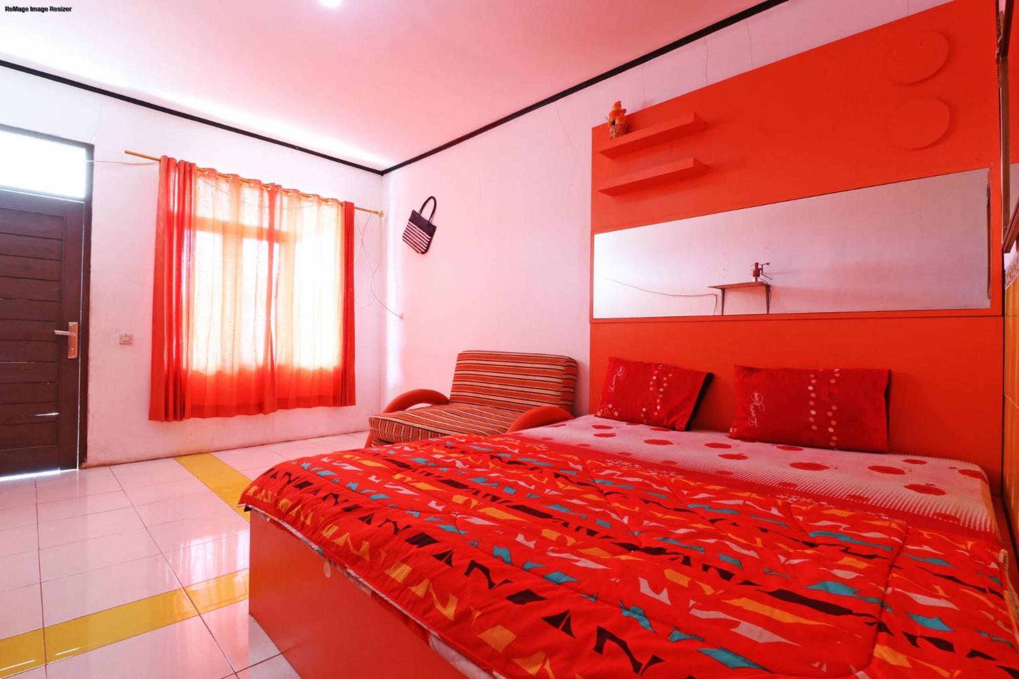 Deluxe Room - Photo 1