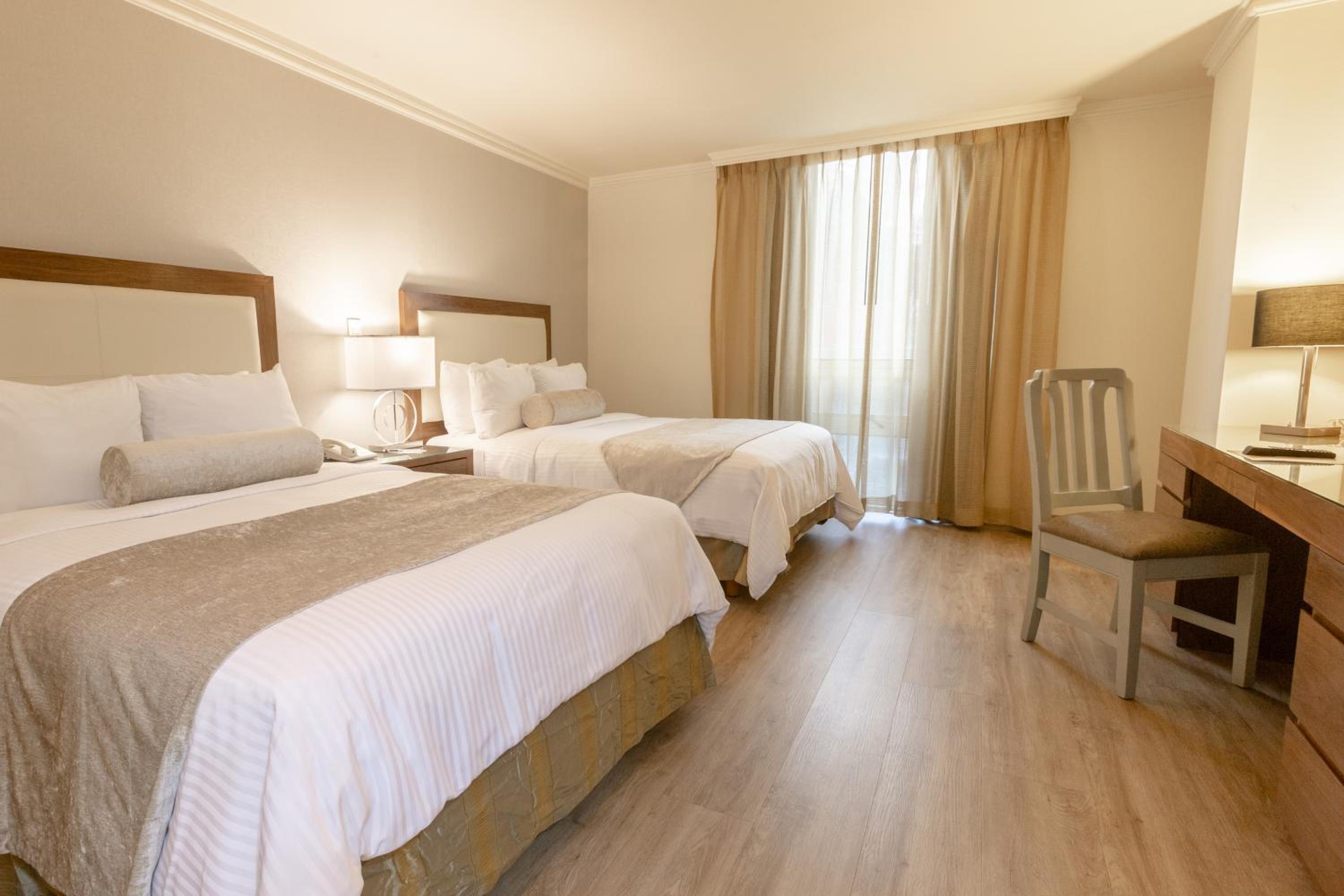 One-Bedroom Suite with Two Double Beds and Sofa Bed - Photo 1