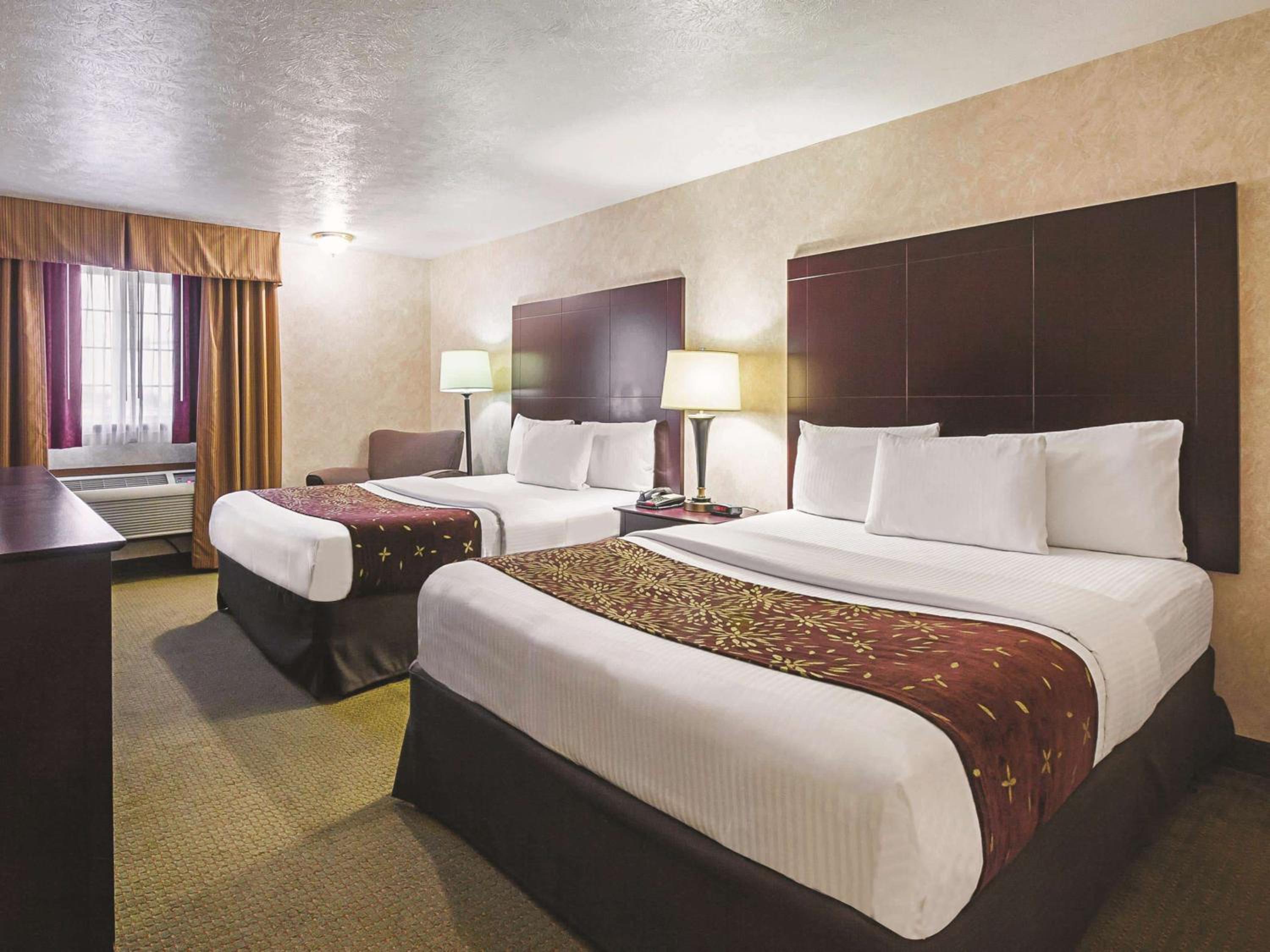 Queen Room with Two Queen Beds - Photo 1