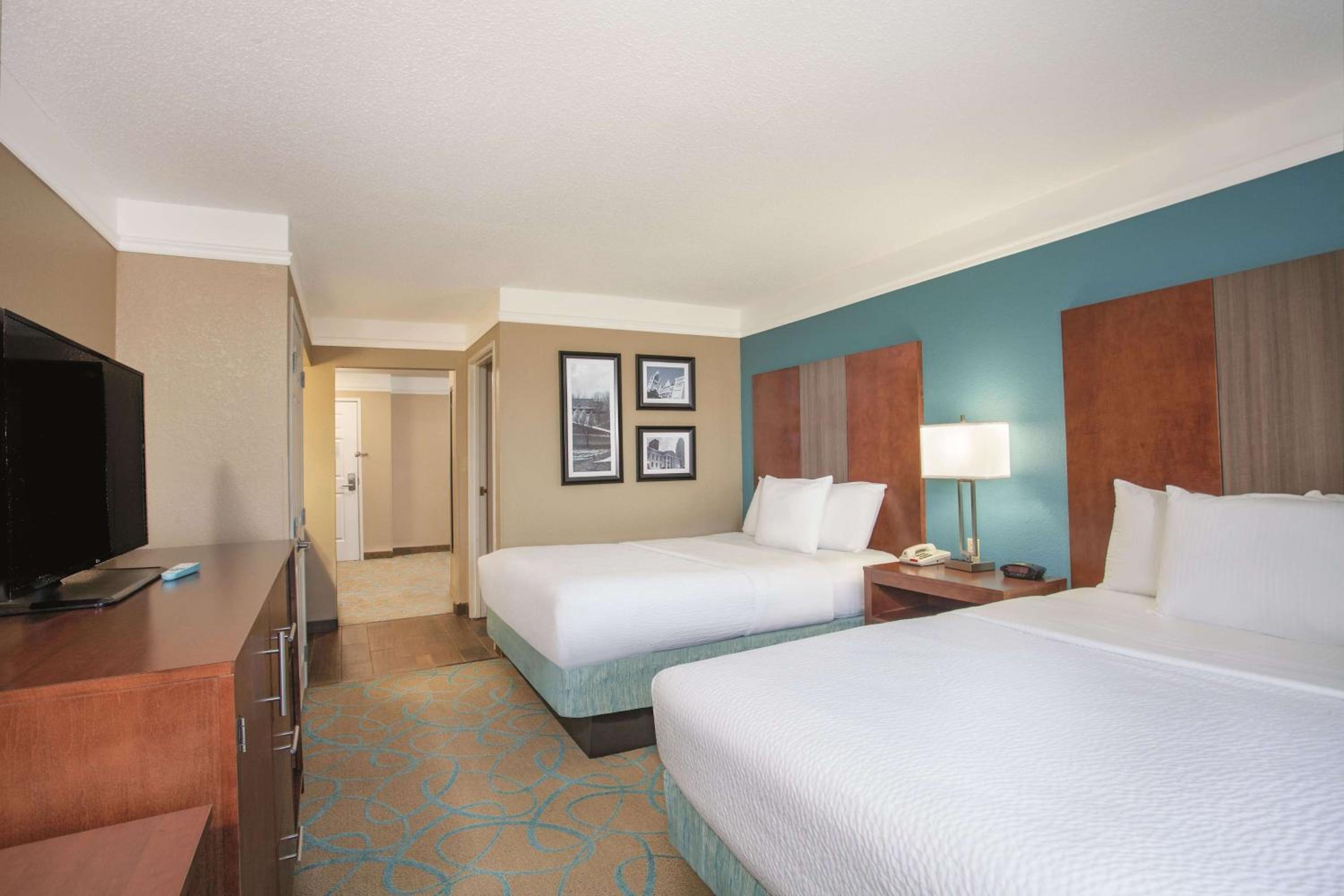 Deluxe Queen Room with Two Queen Beds - Photo 1