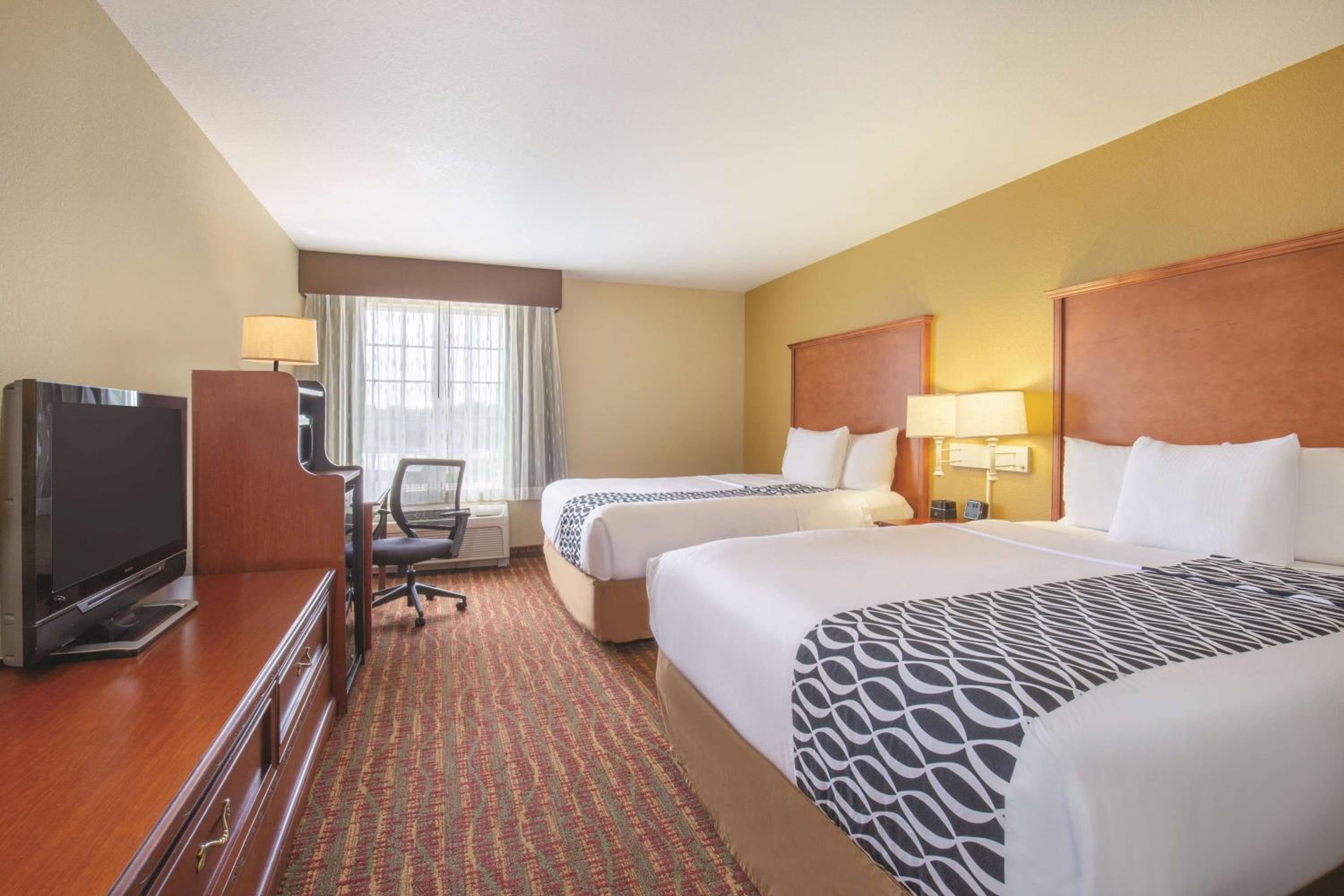 Deluxe Queen Room with Two Queen Beds - Photo 1