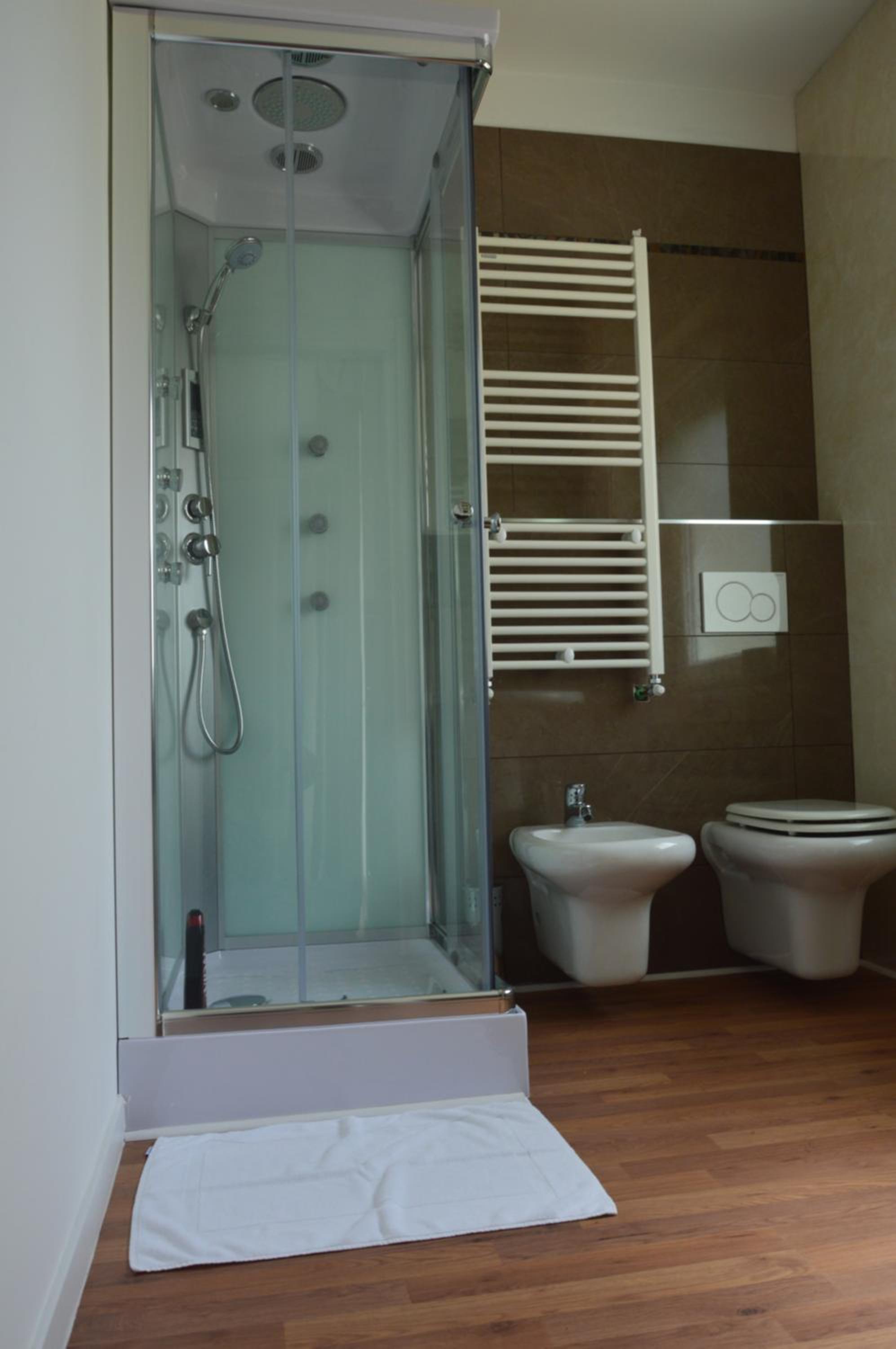 Deluxe Quadruple Room - Photo 7