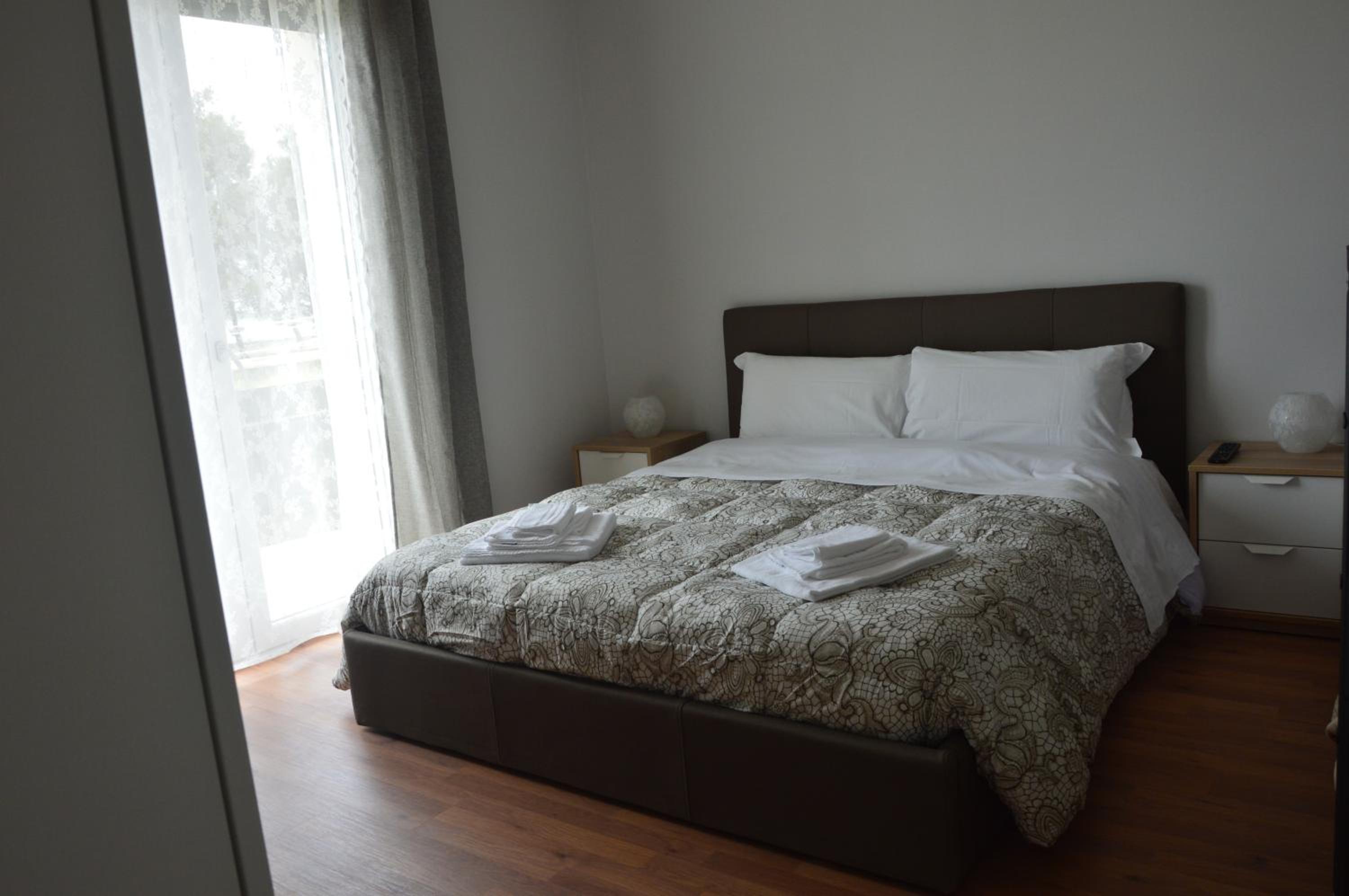 Deluxe Quadruple Room - Photo 9