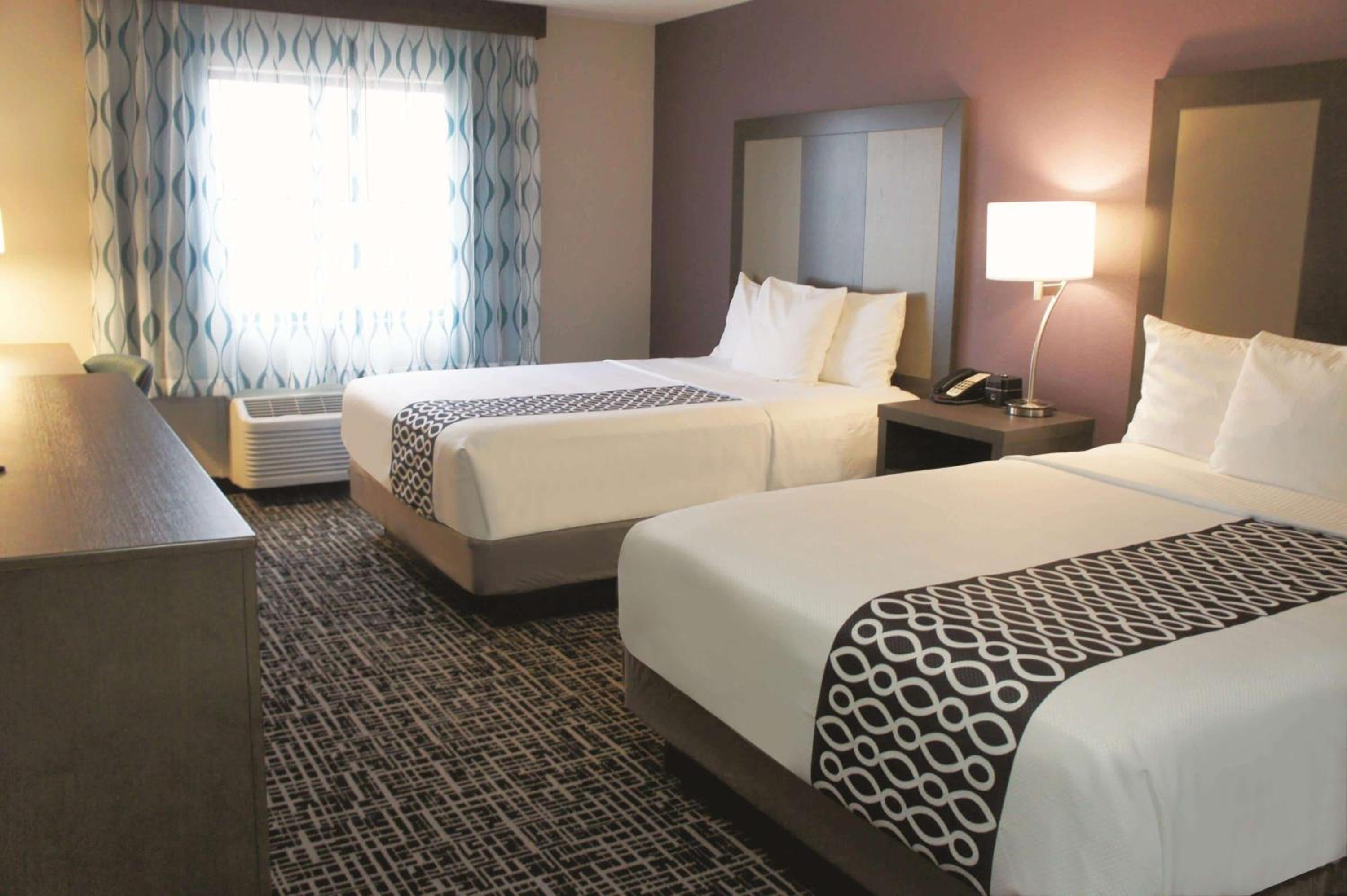 Deluxe Queen Room with Two Queen Beds - Photo 1