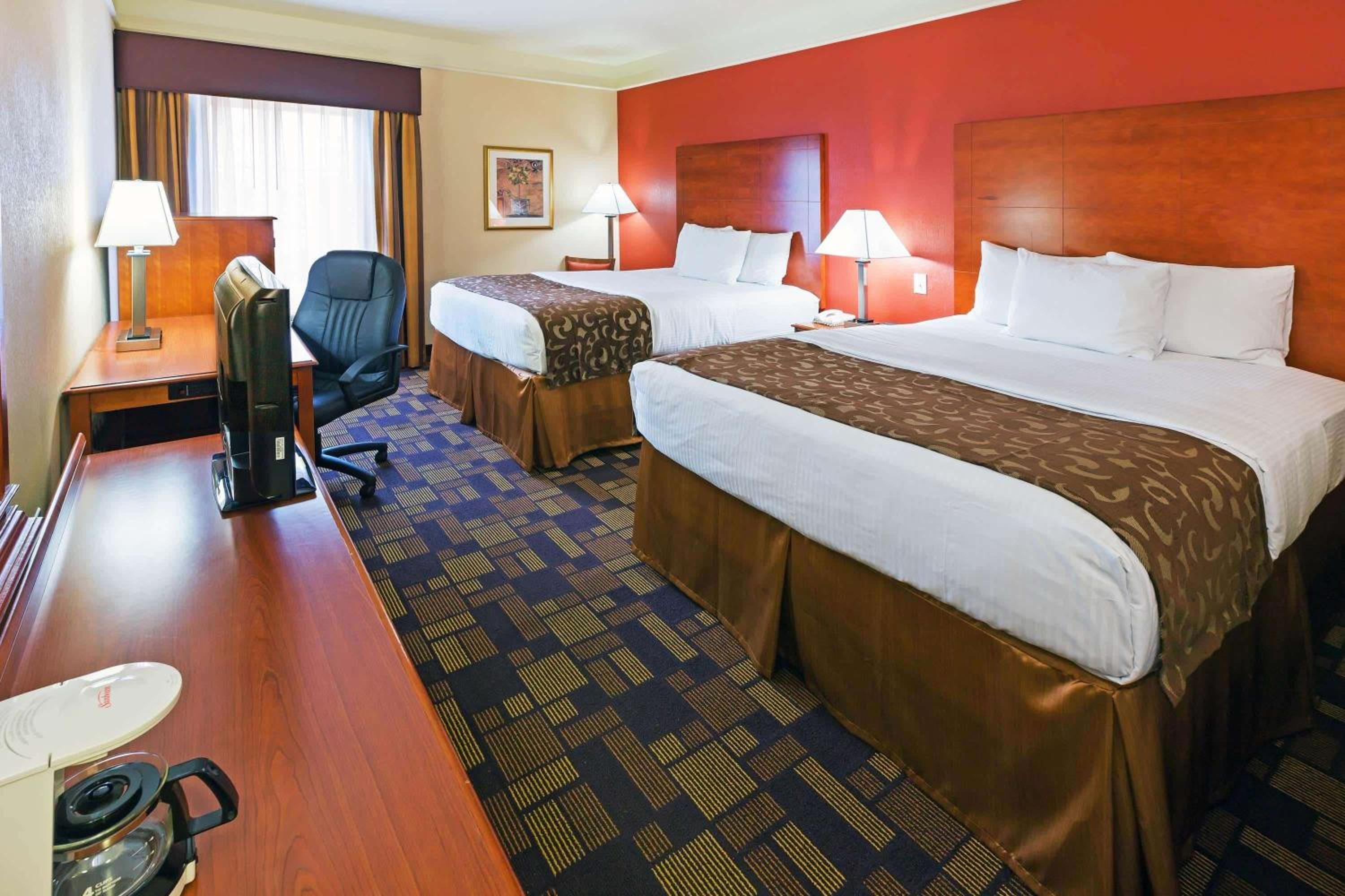 Queen Room with Two Queen Beds - Photo 1