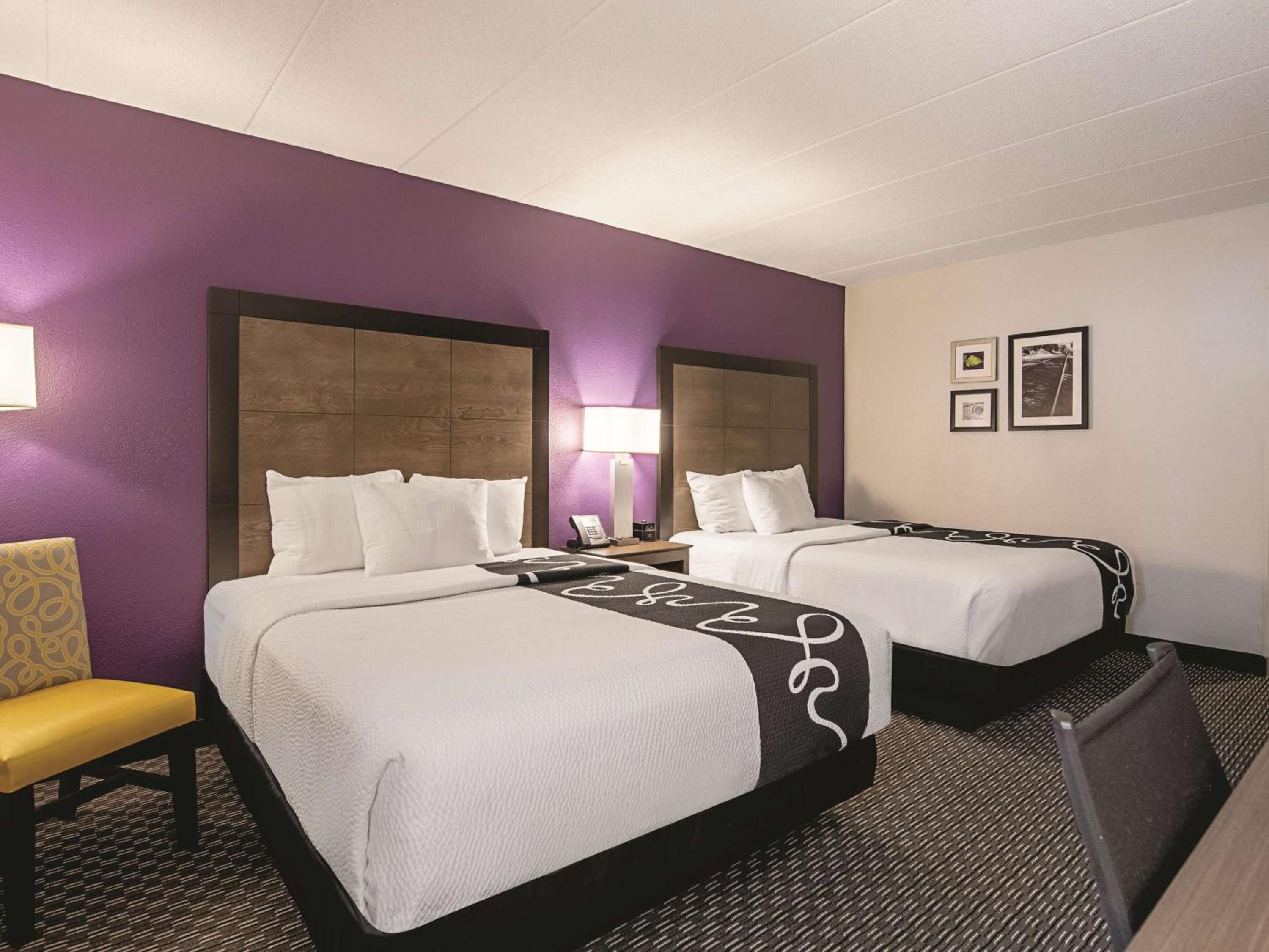 Deluxe Room with Two Queen Beds - Photo 1