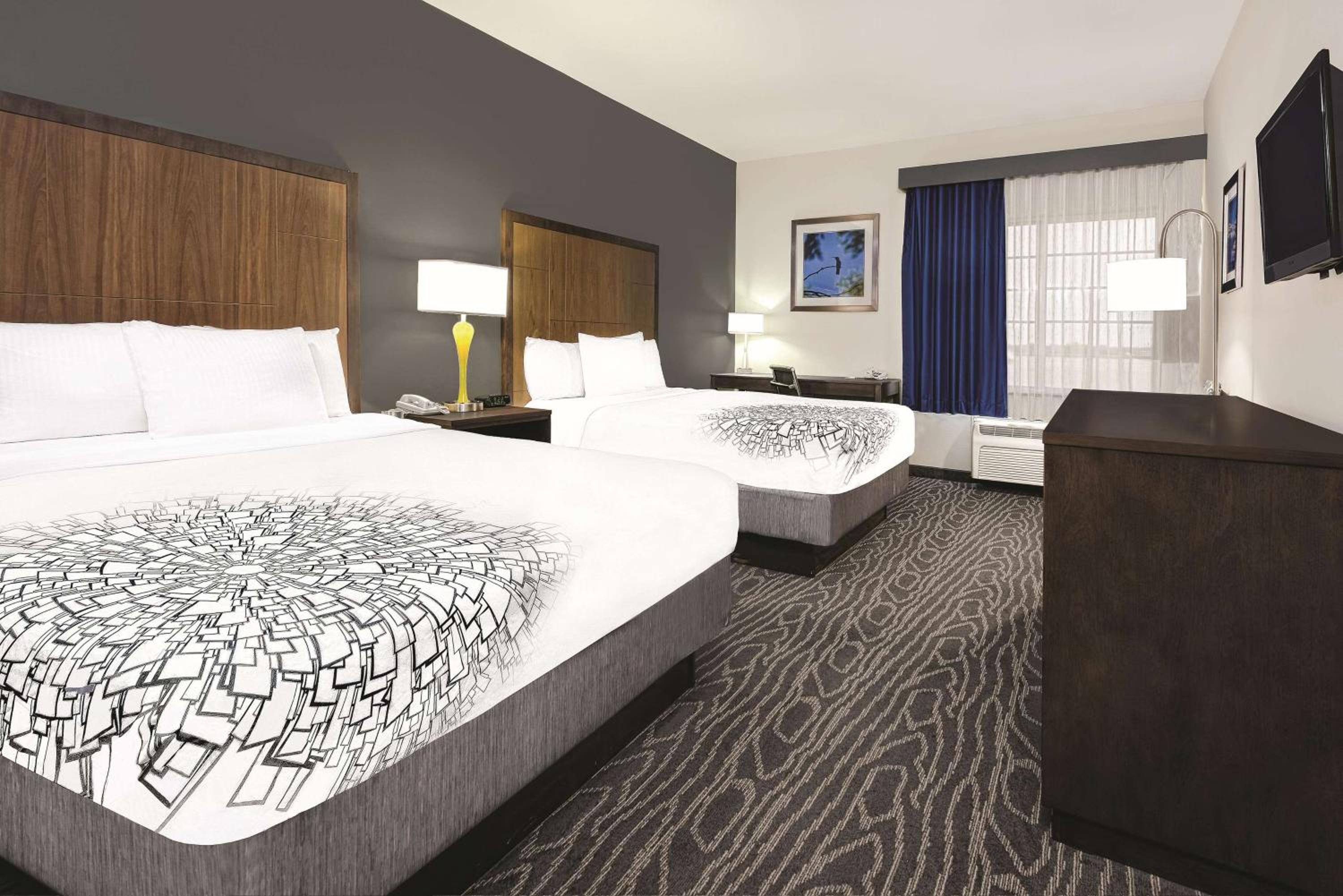 Deluxe Queen Room with Two Queen Beds - Non-Smoking photo 1