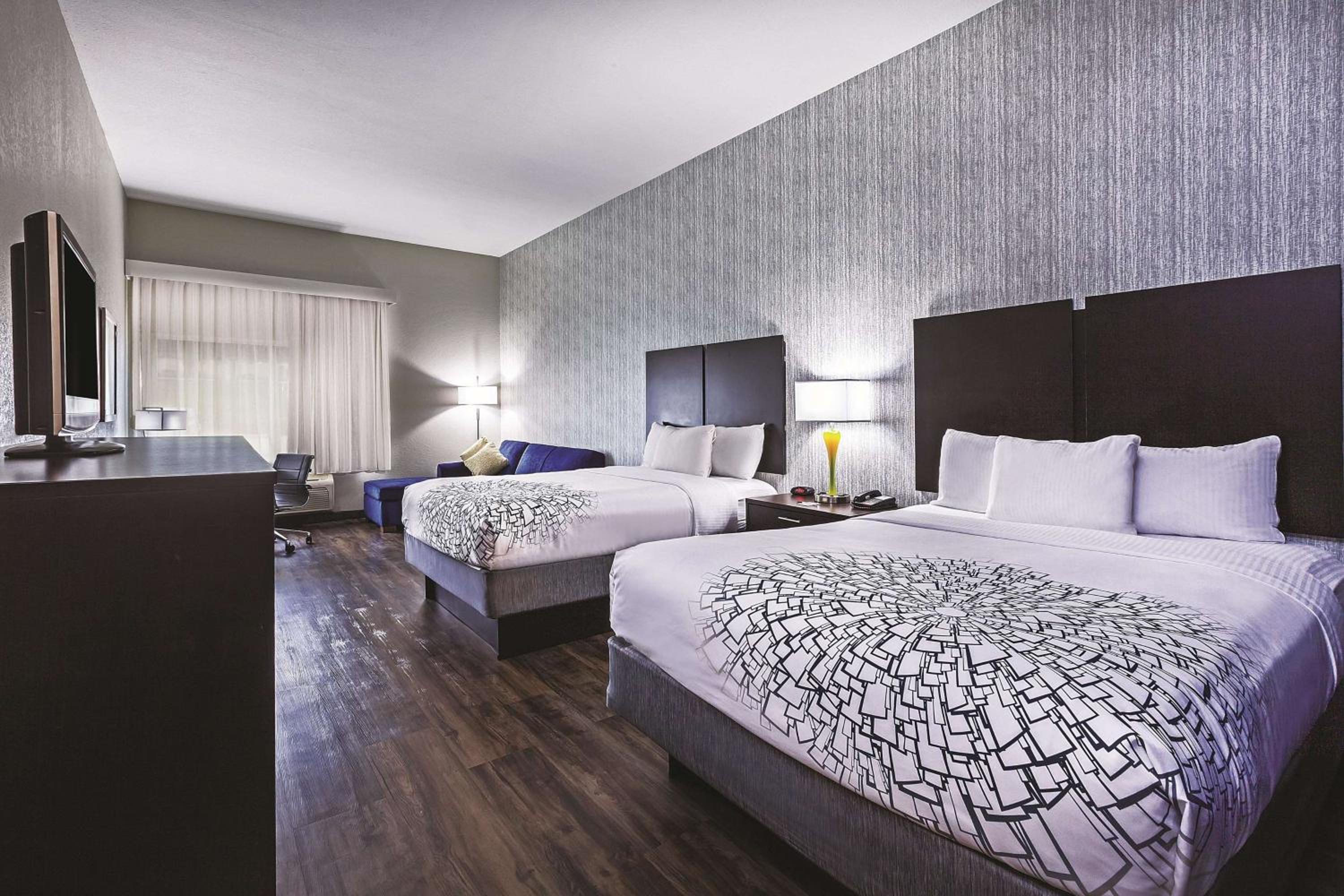 Queen Suite with Two Queen Beds and Limited View - Non-Smoking - Photo 1