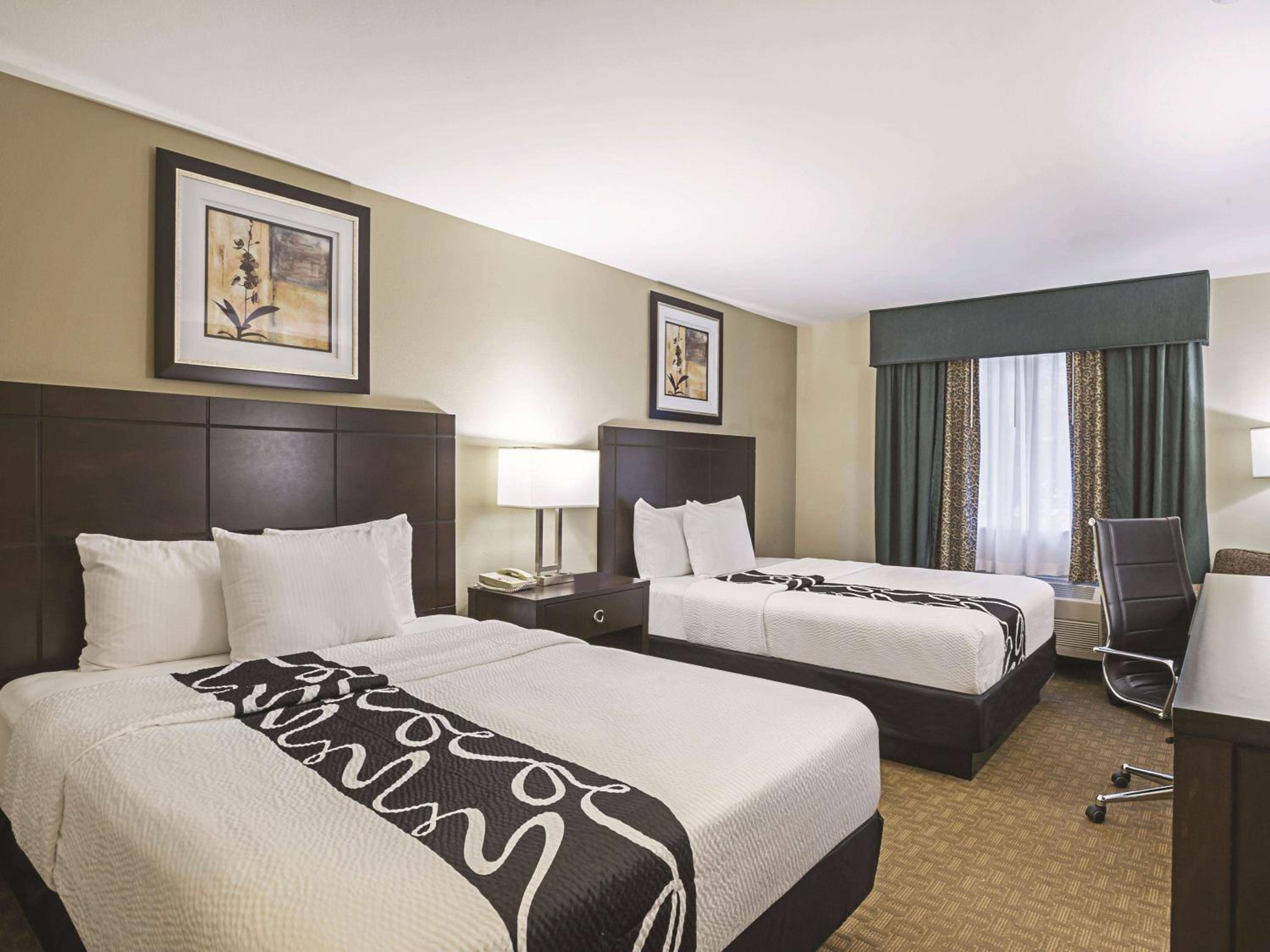 Deluxe Queen Room with Two Queen Beds - Photo 1