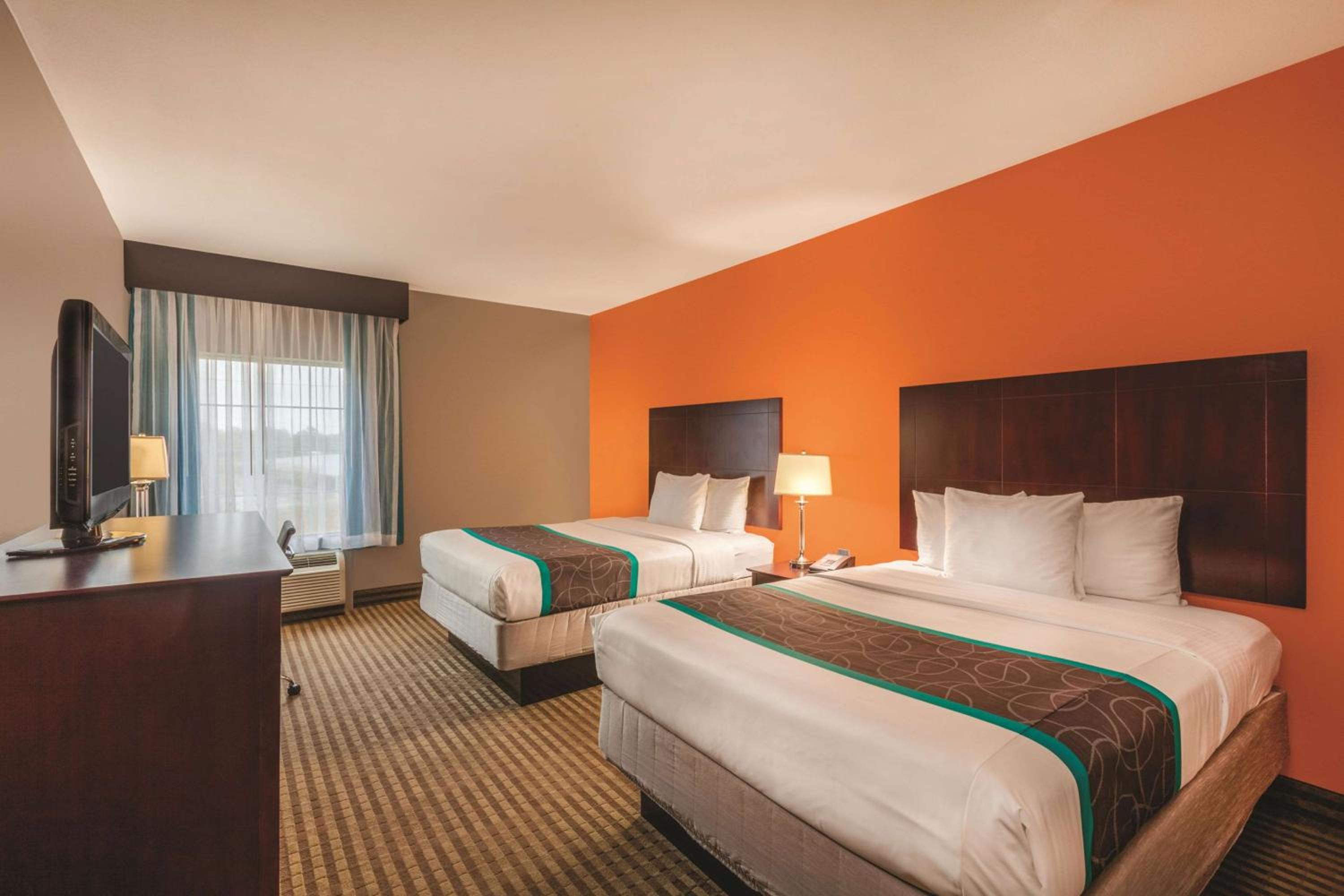 Queen Room with Two Queen Beds and Roll-In Shower - Mobility/Hearing Accessible - Non-Smoking - Photo 1