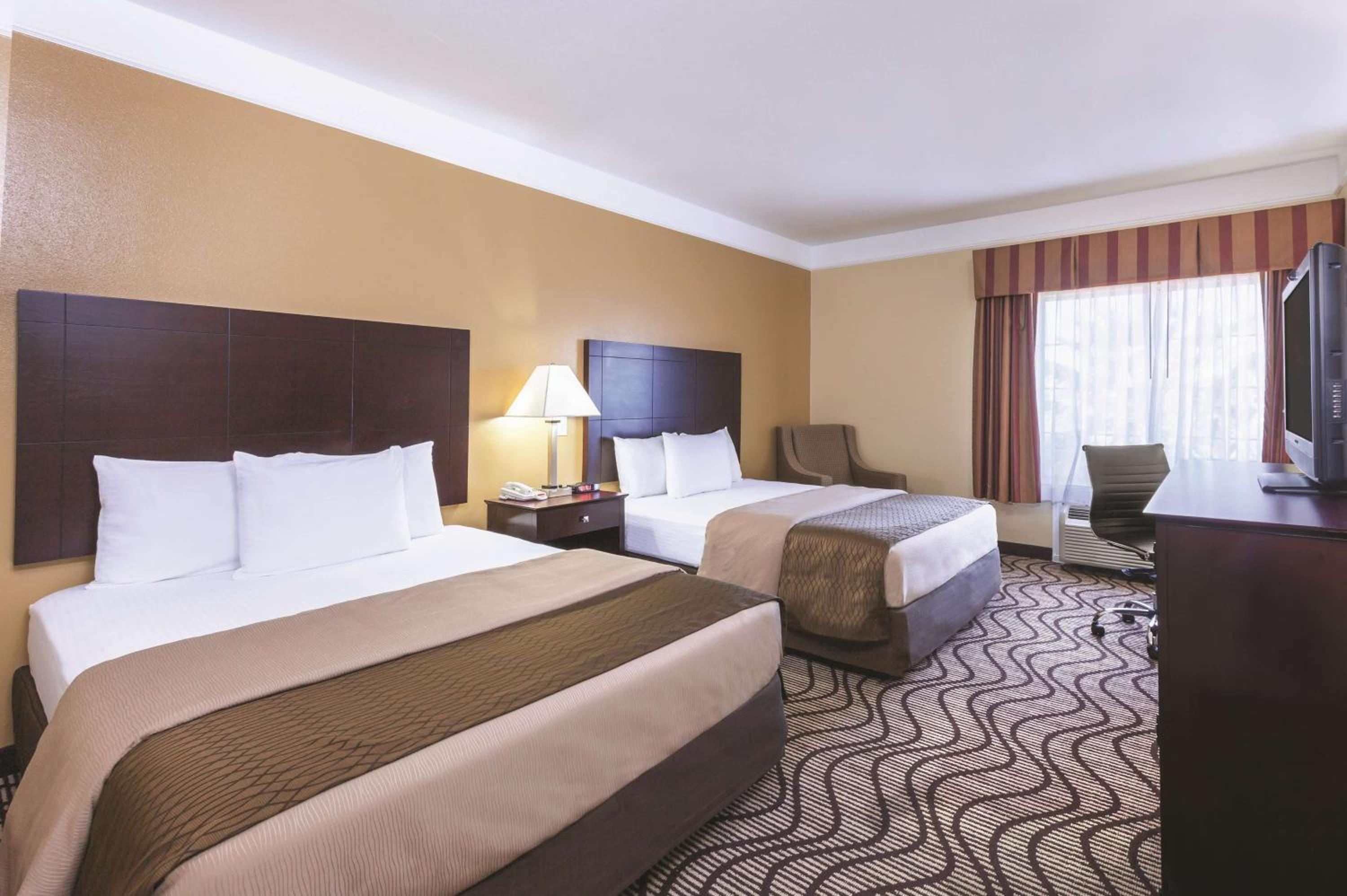 Deluxe Queen Room with Two Queen Beds - Photo 1