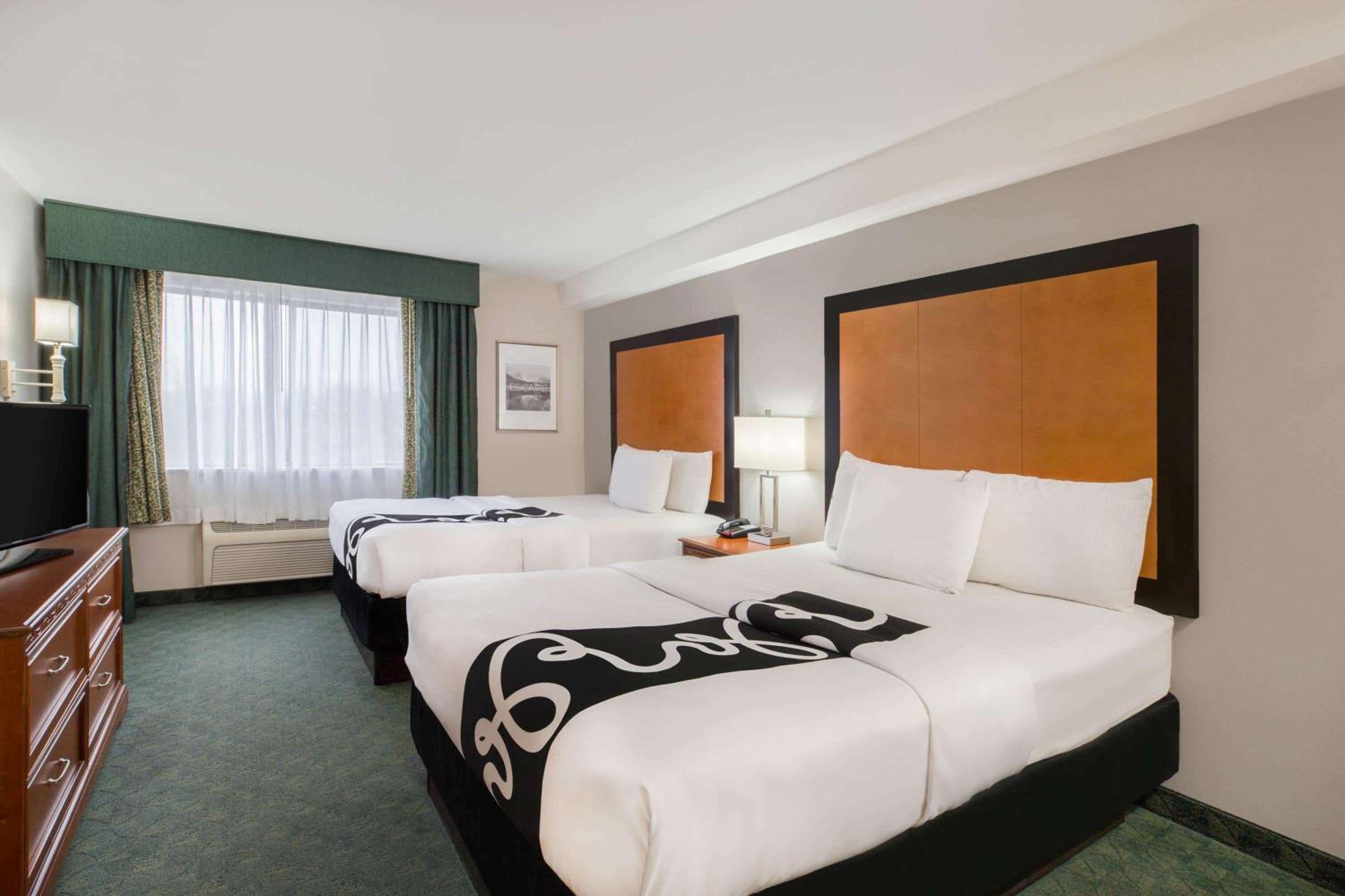 Queen Room with Two Queen Beds - Photo 1