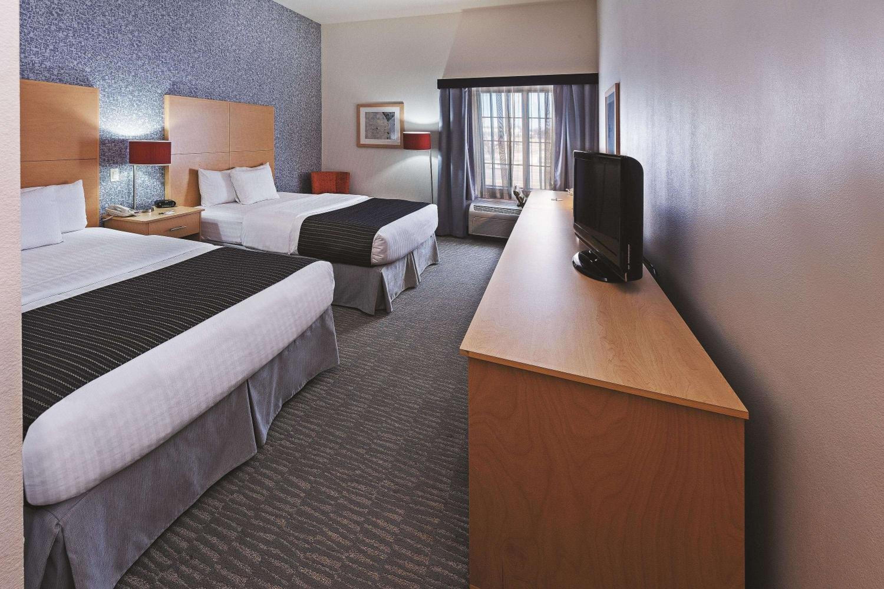 Deluxe Queen Room with Two Queen Beds - Photo 1