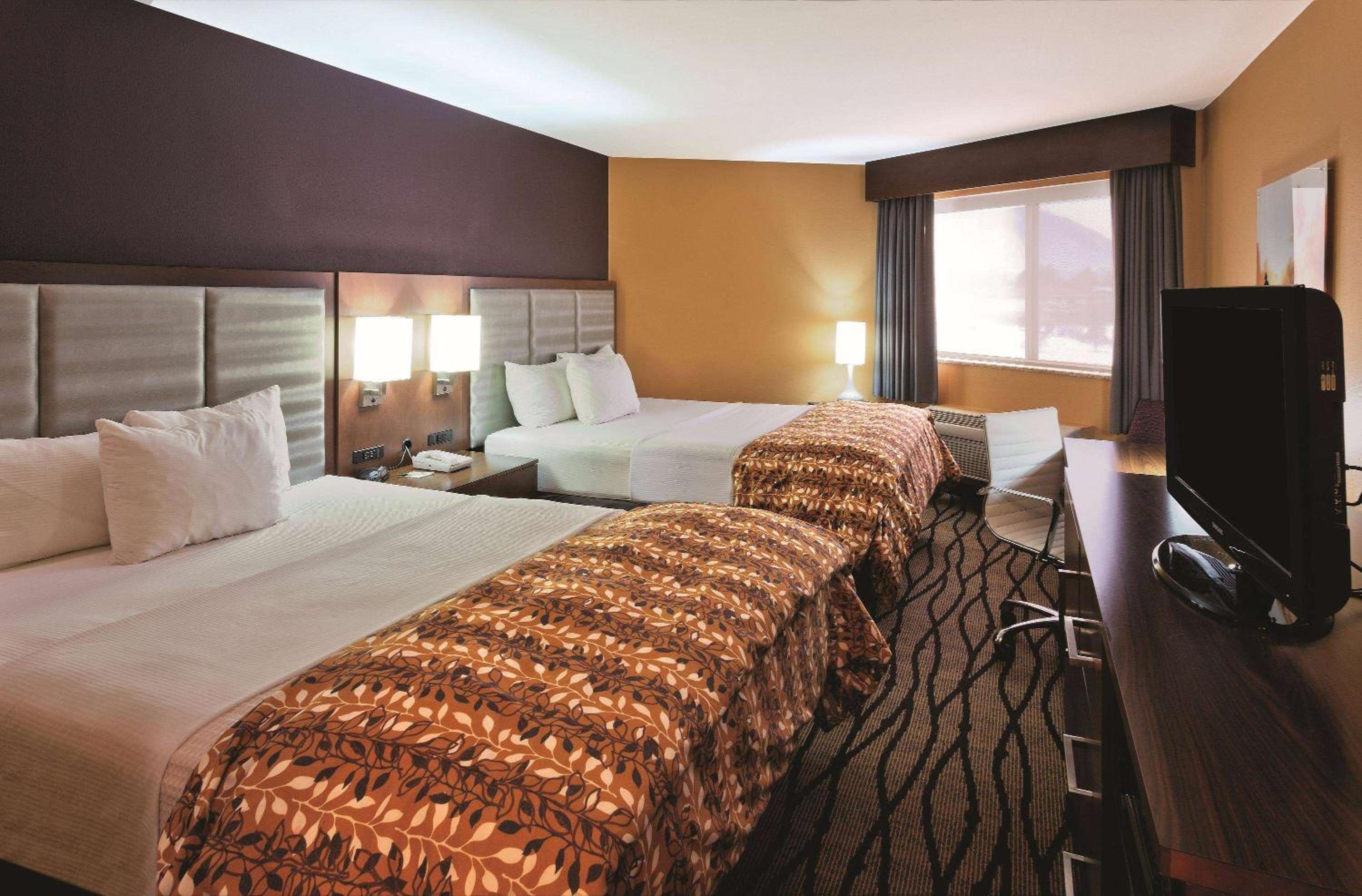 Deluxe Queen Room with Two Queen Beds - Photo 1