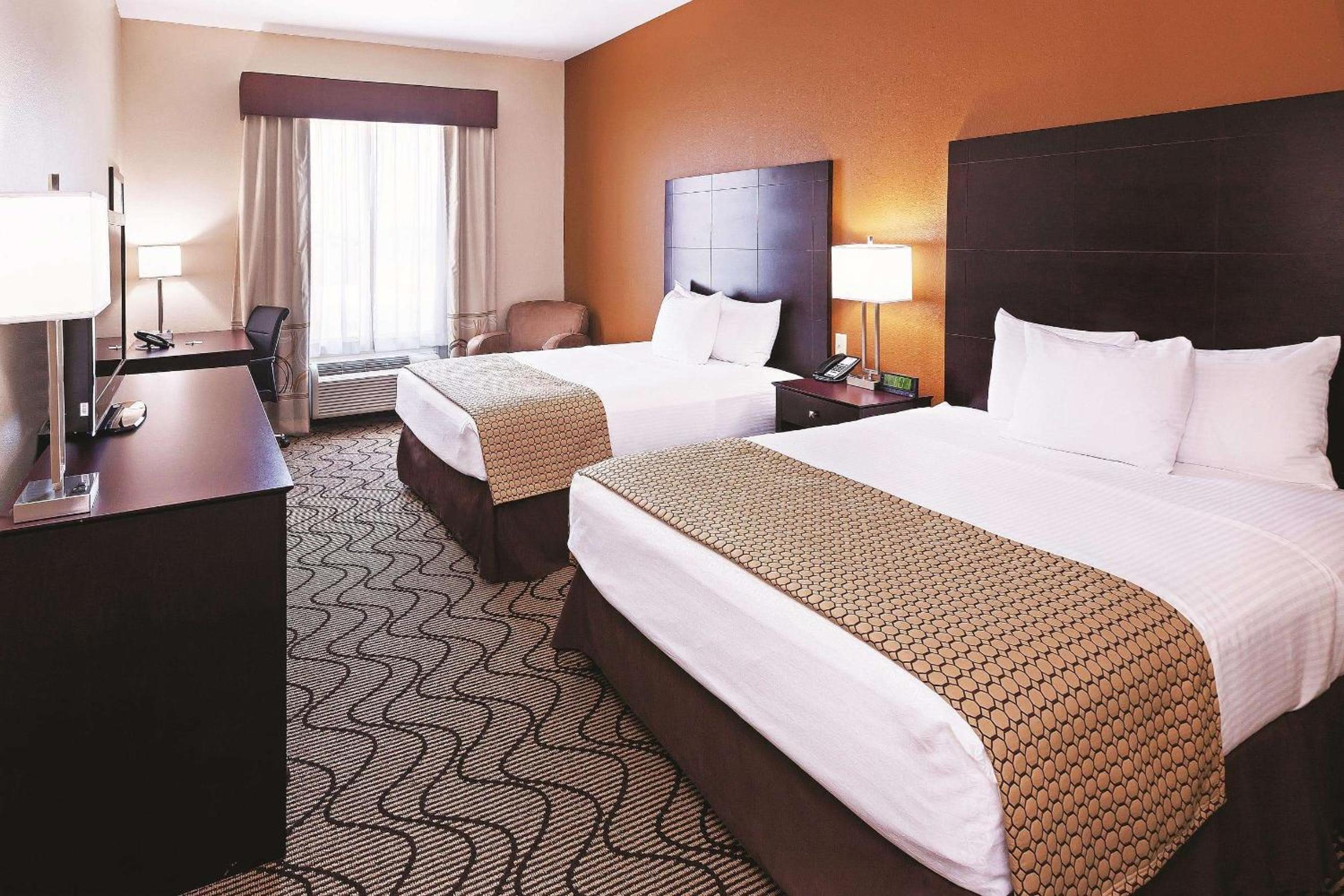 Queen Room with Two Queen Beds and Bath Tub - Mobility Accessible/Non-Smoking - Photo 1