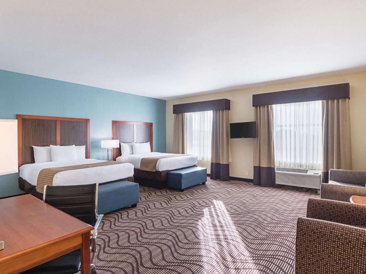 Deluxe Queen Room with Two Queen Beds and Roll-In Shower - Mobility/Hearing Accessible - Non-Smoking photo 1