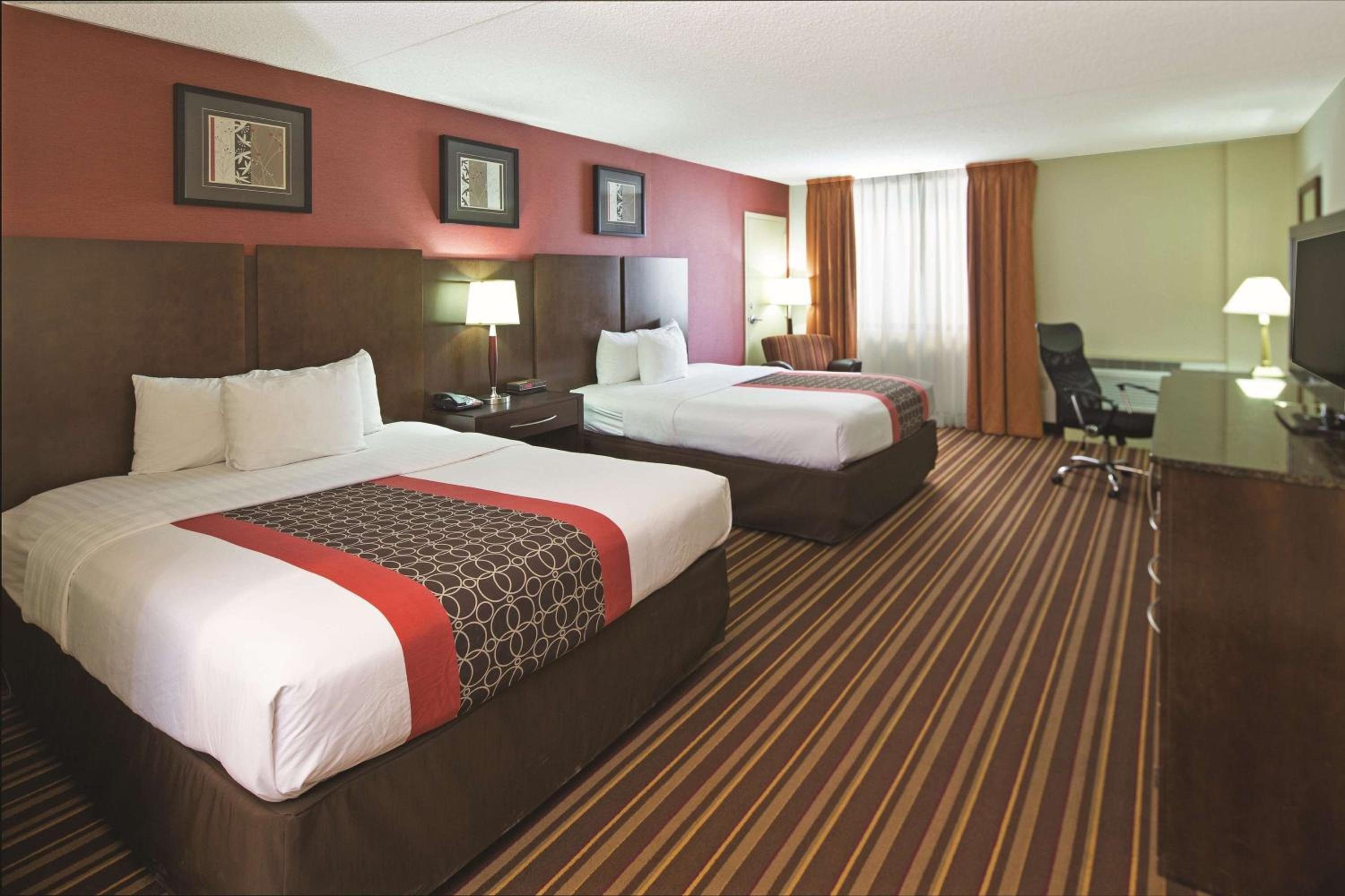 Queen Room with Two Queen Beds - Photo 1
