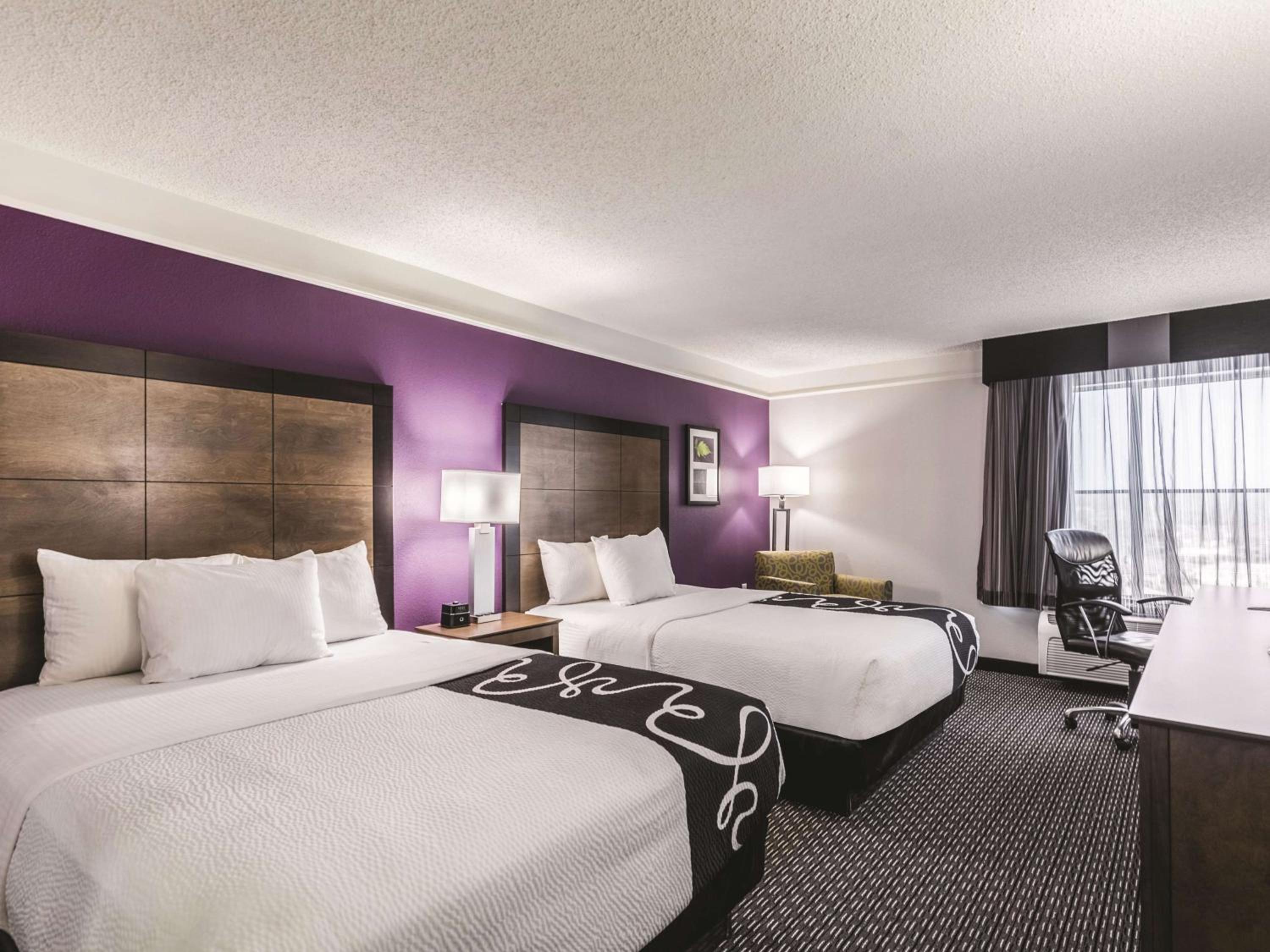 Deluxe Queen Room with Two Queen Beds - Microwave and Refrigerator - Photo 1