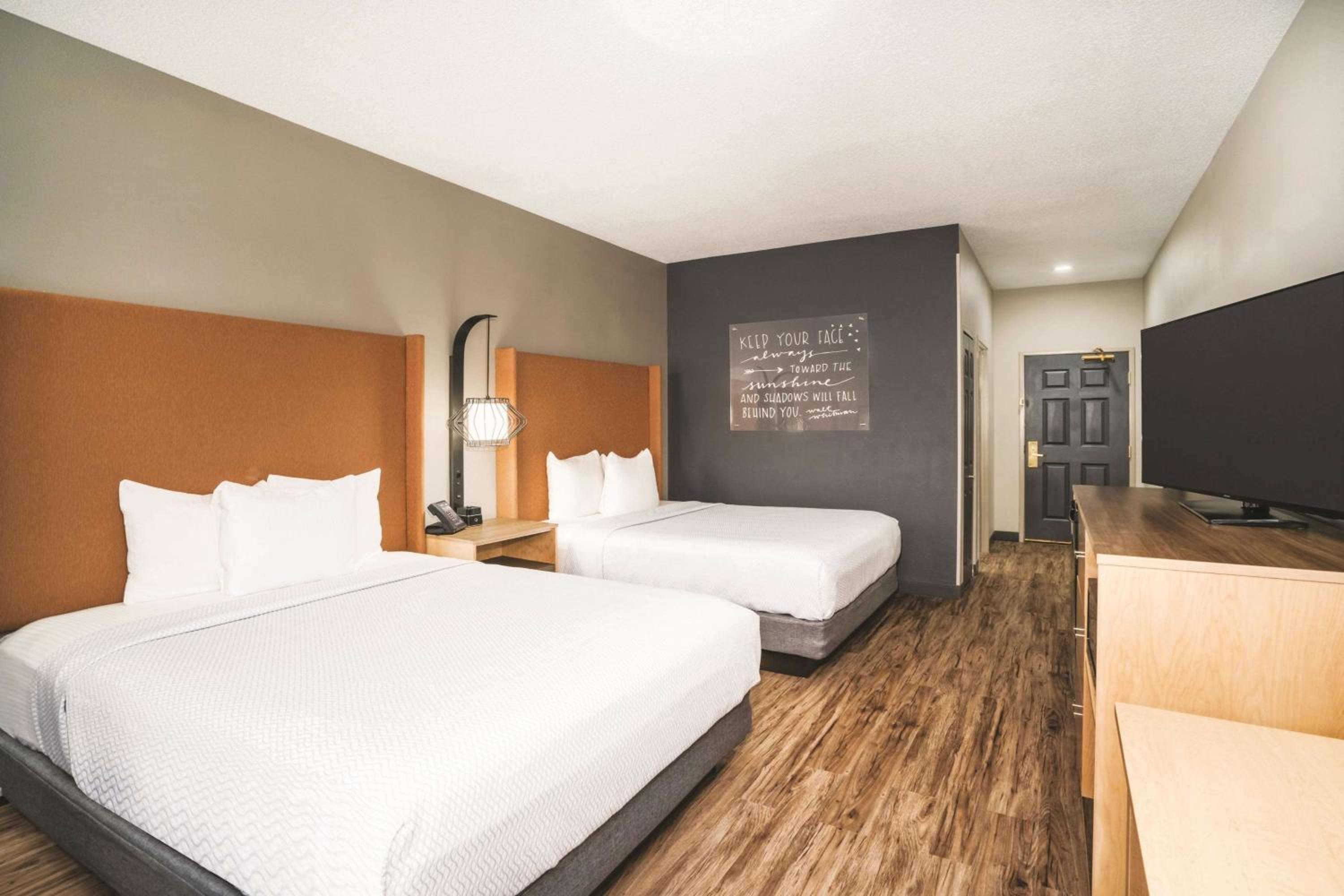 Queen Room with Two Queen Beds - Photo 1