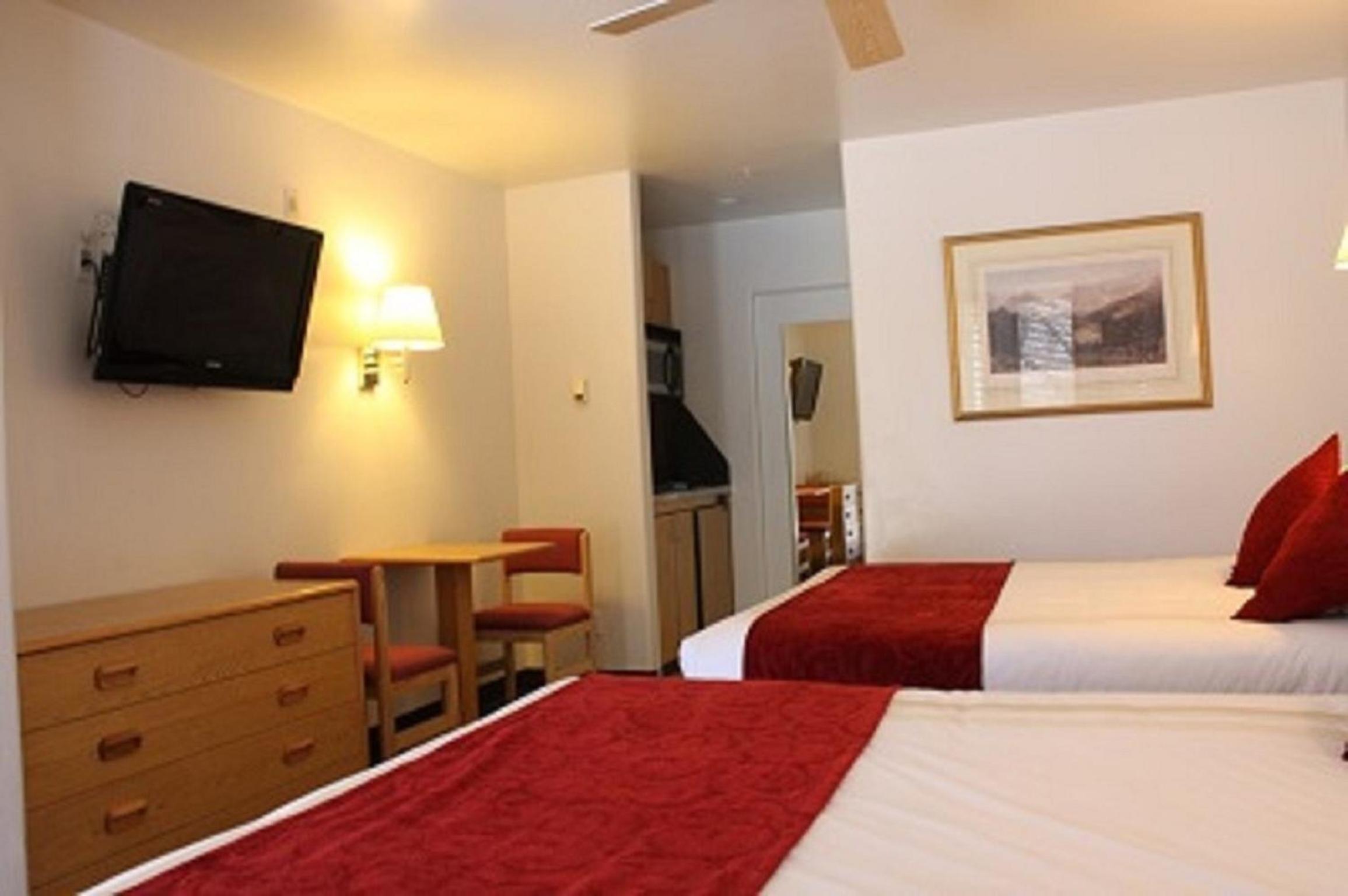 Queen Room with Two Queen Beds - Photo 1