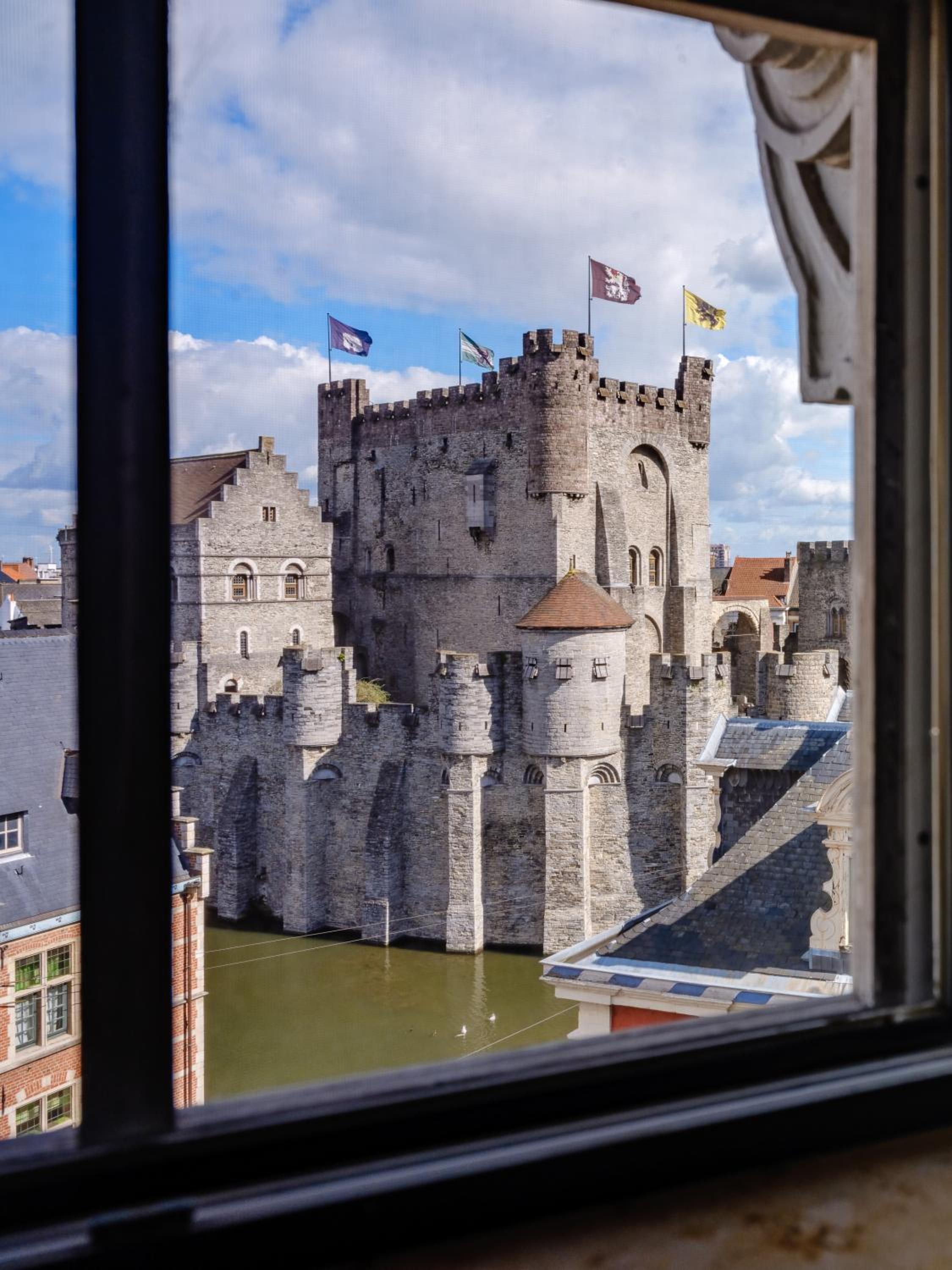 view of a castle from the window of a building